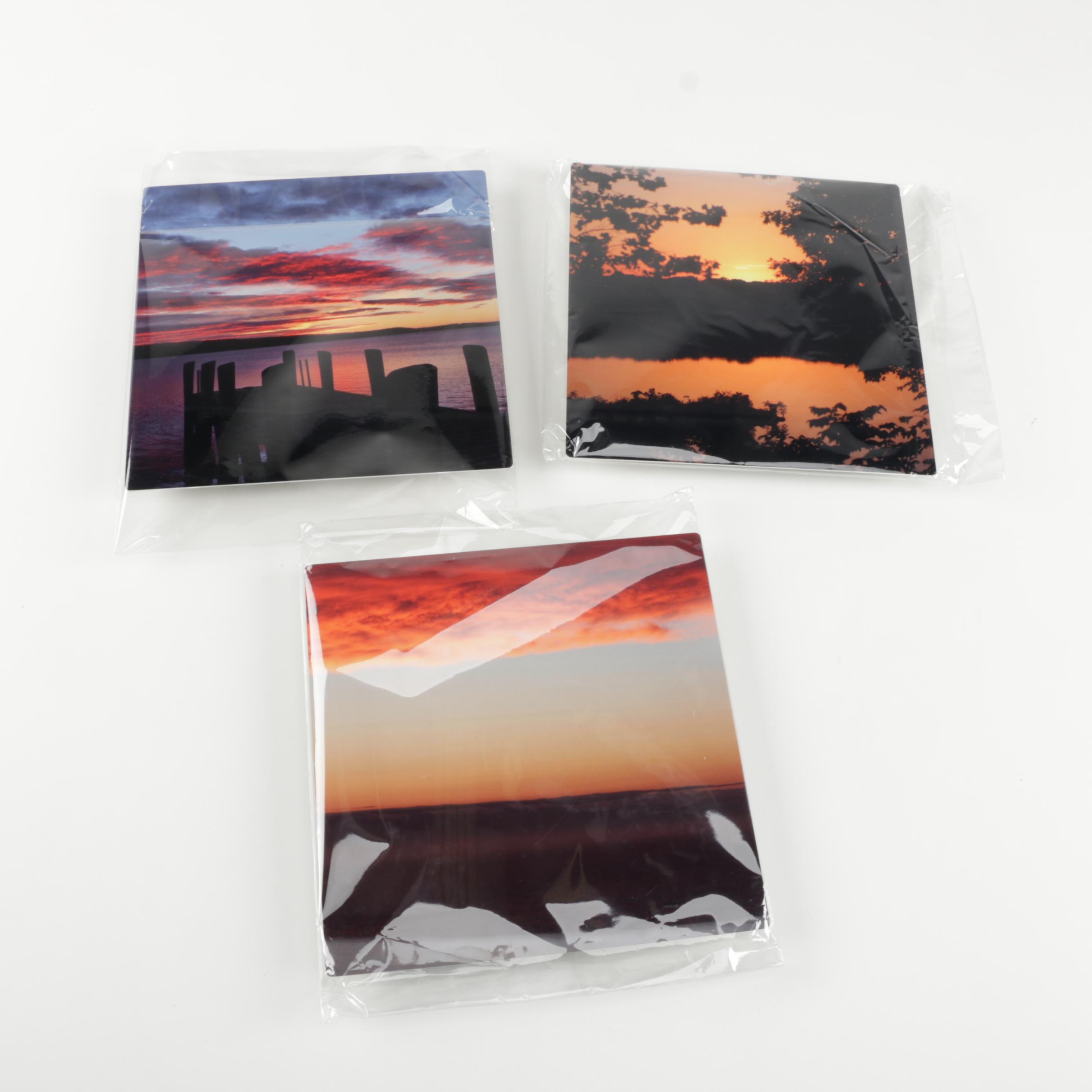 Digital Photographs of Sunsets Over Water