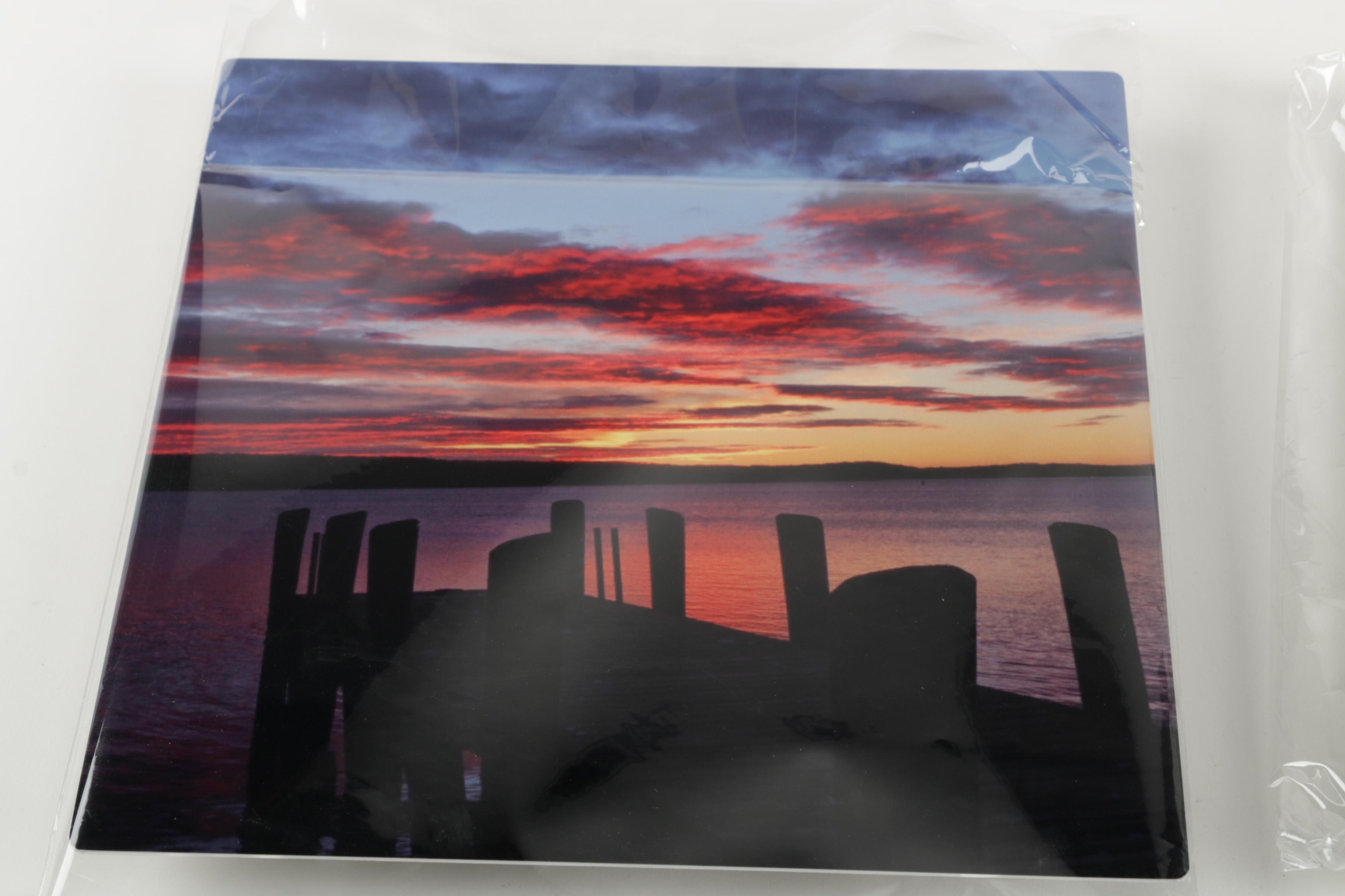 Digital Photographs of Sunsets Over Water