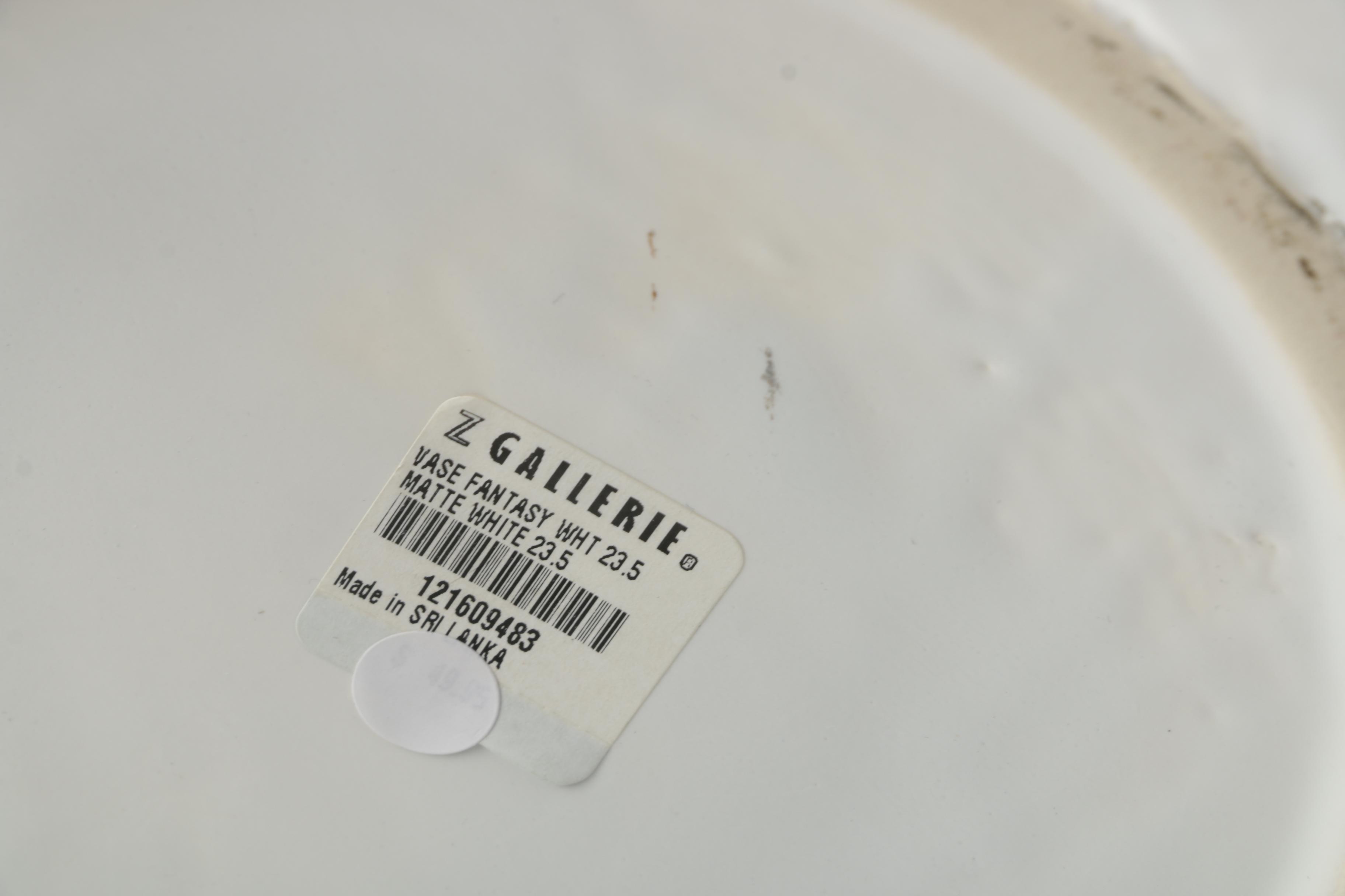 Two White Decorative Ceramic Vases