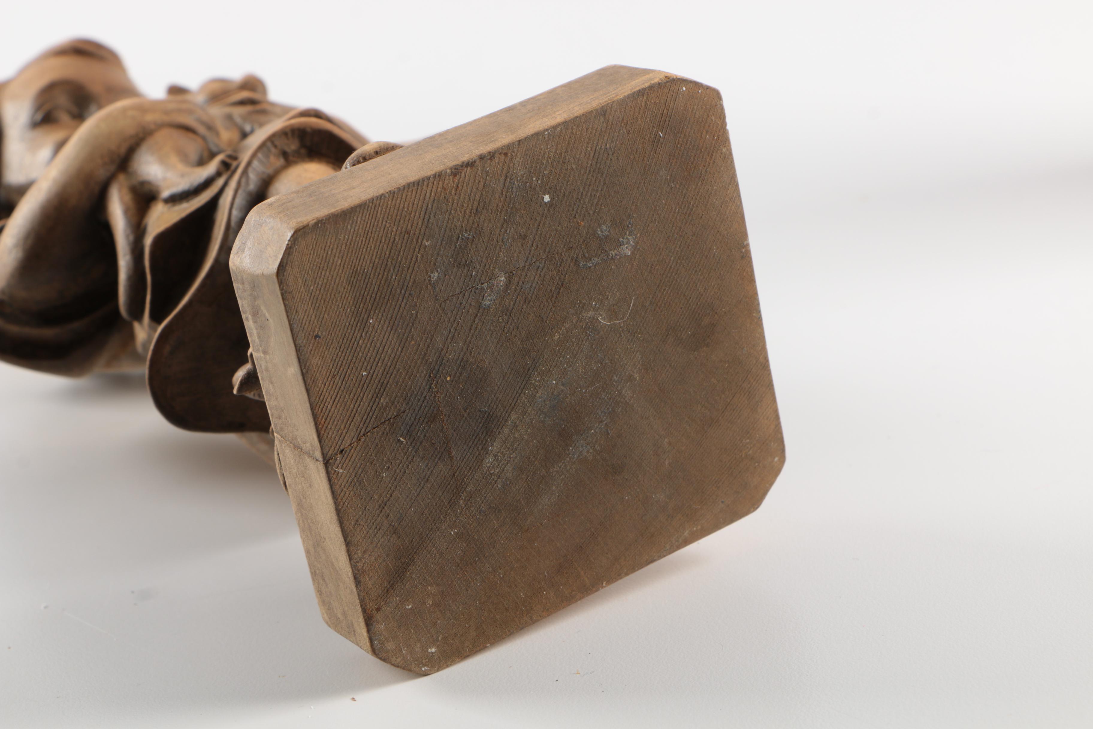 Carved Wood Figurines Featuring Children