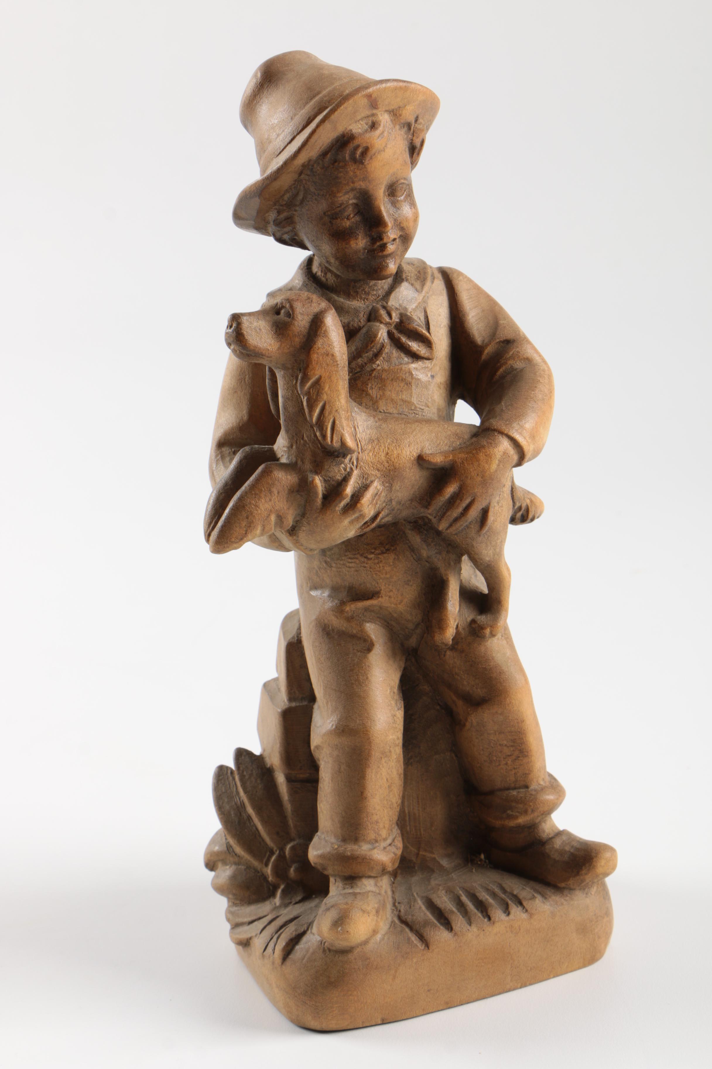 Carved Wood Figurines Featuring Children
