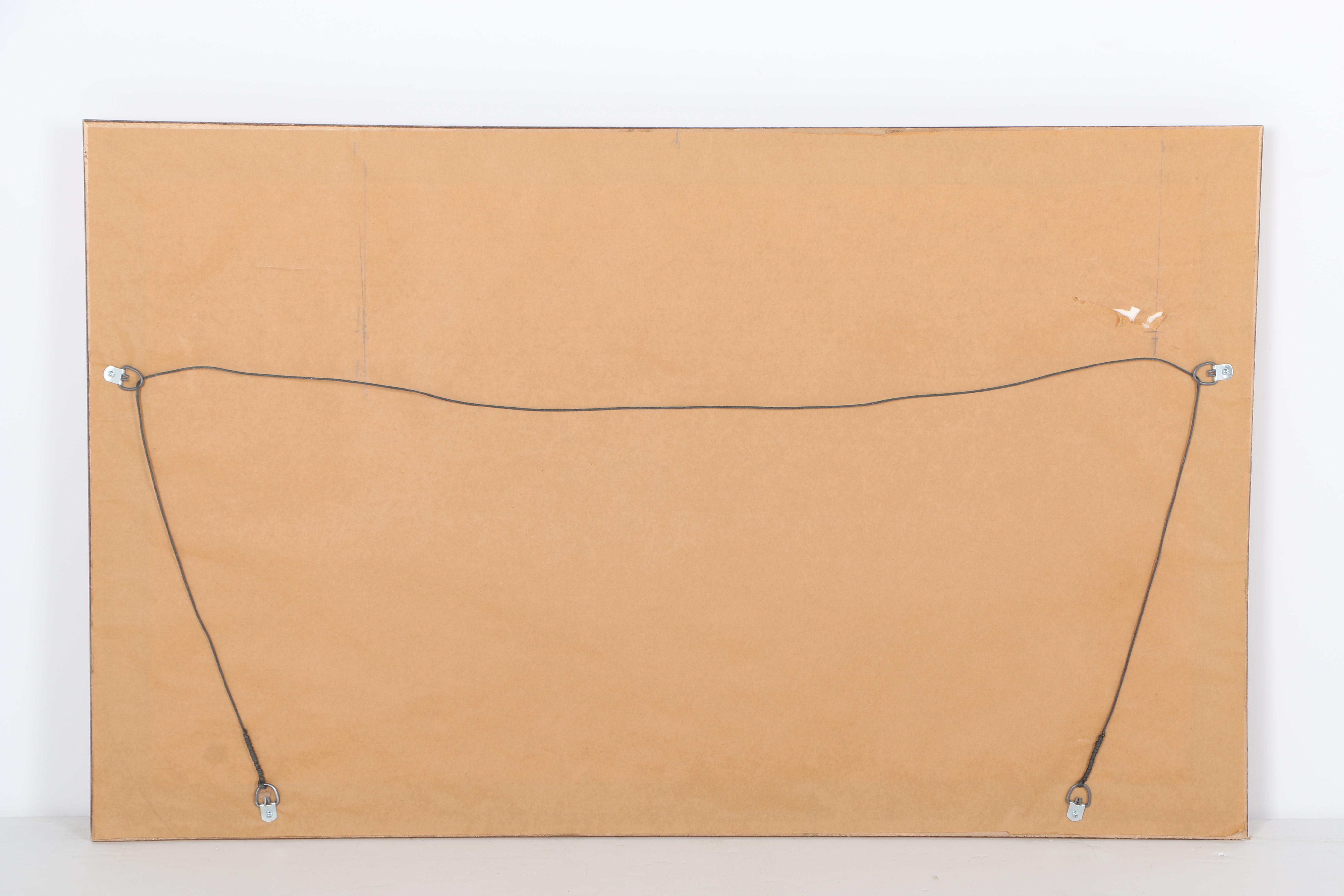 Ornately Framed Beveled Wall Mirror