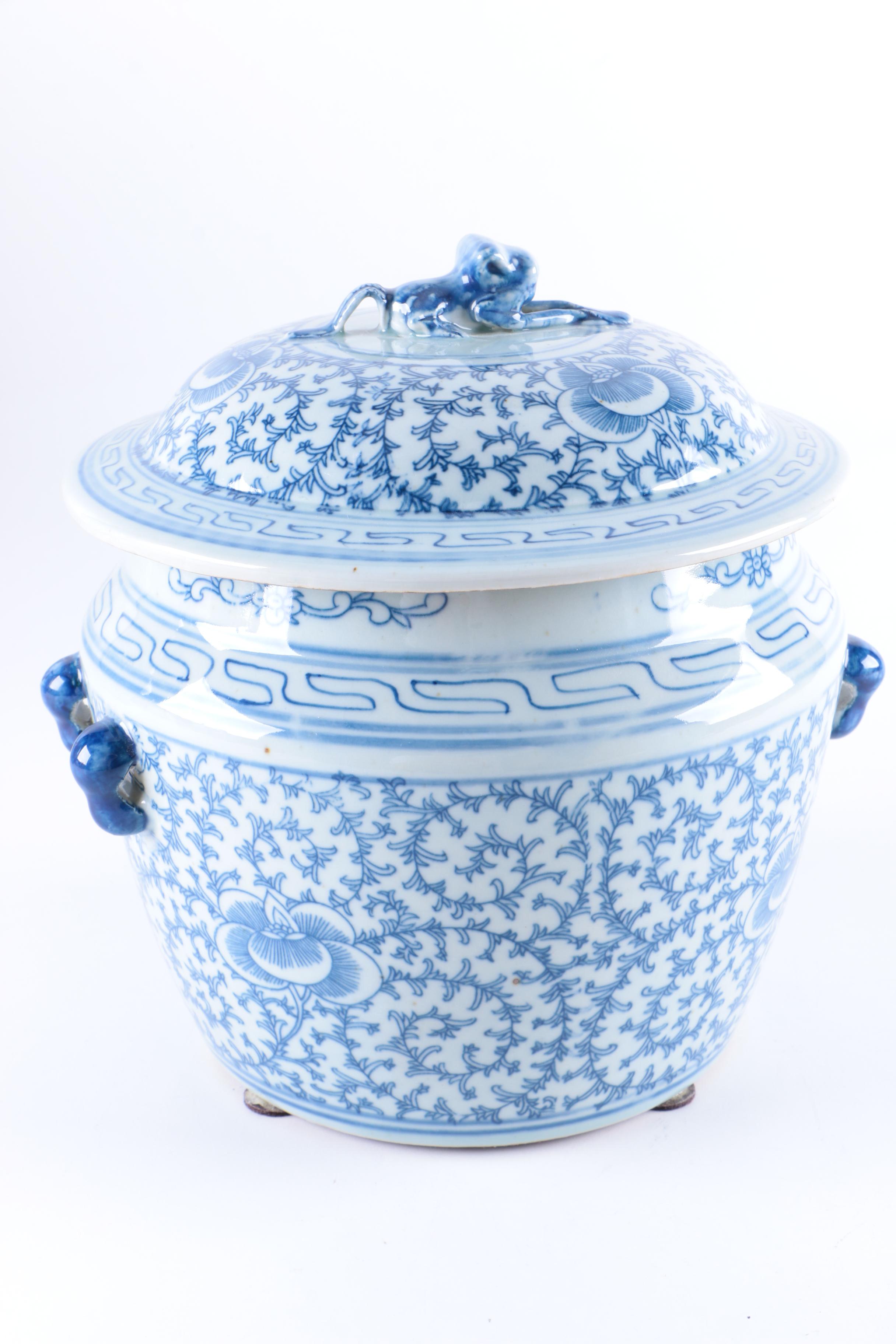 A Set of Three Chinese Blue and White Floral Motif Vases