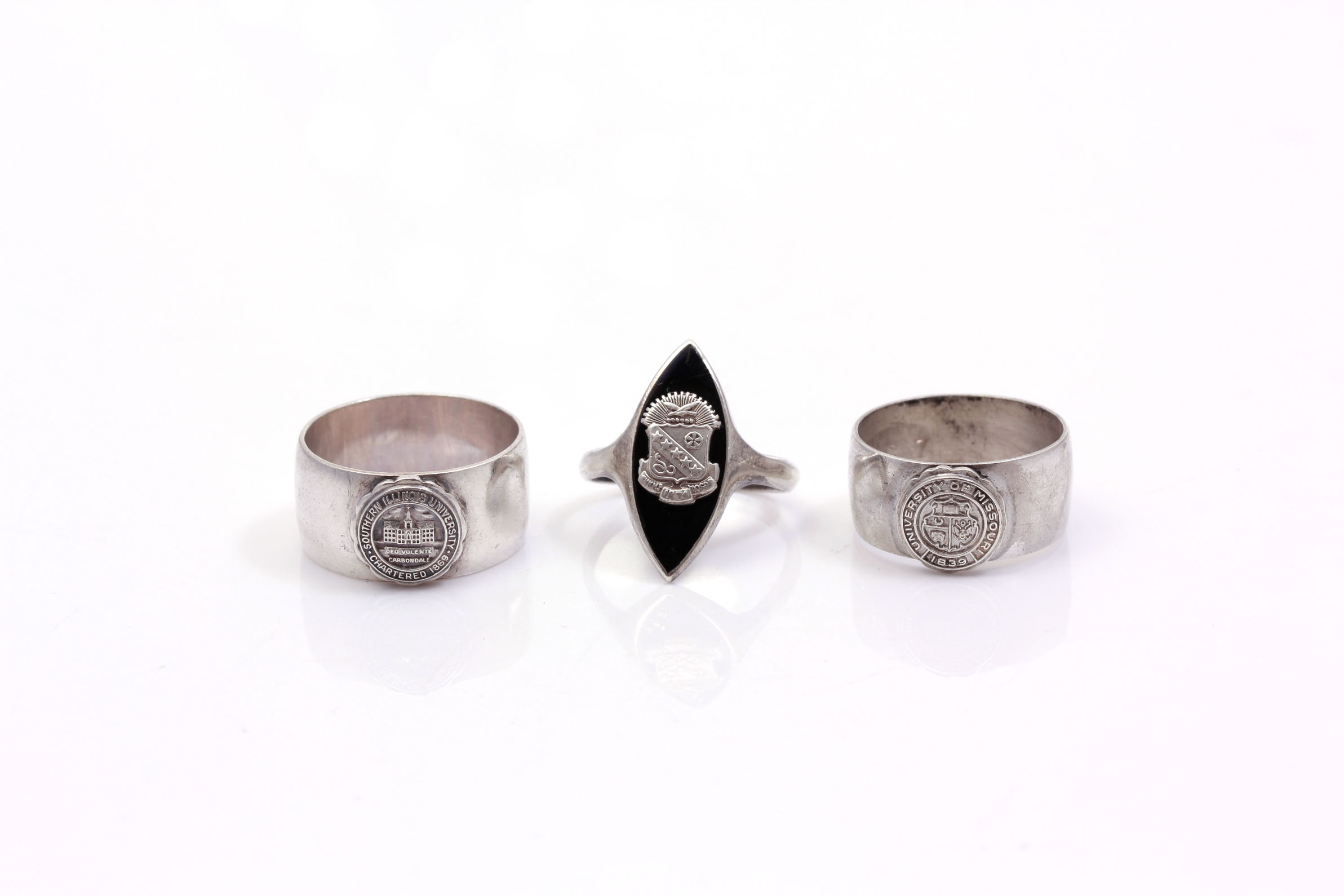 Sterling Silver Collegiate and Coat of Arm Rings