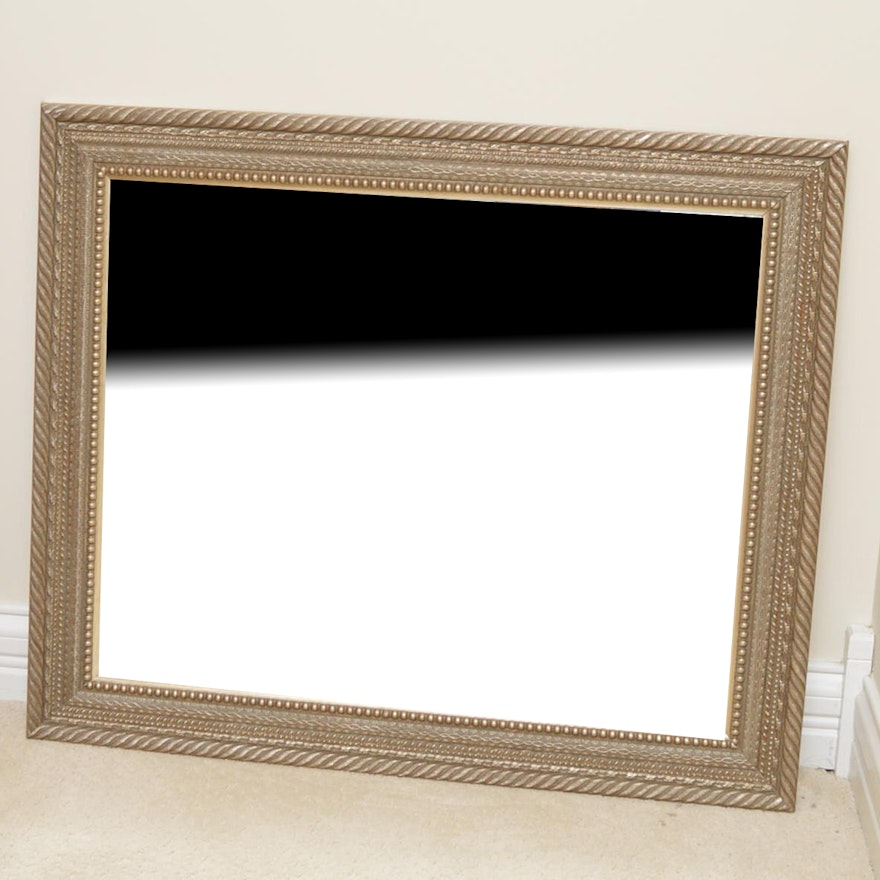 Ornately Framed Beveled Wall Mirror