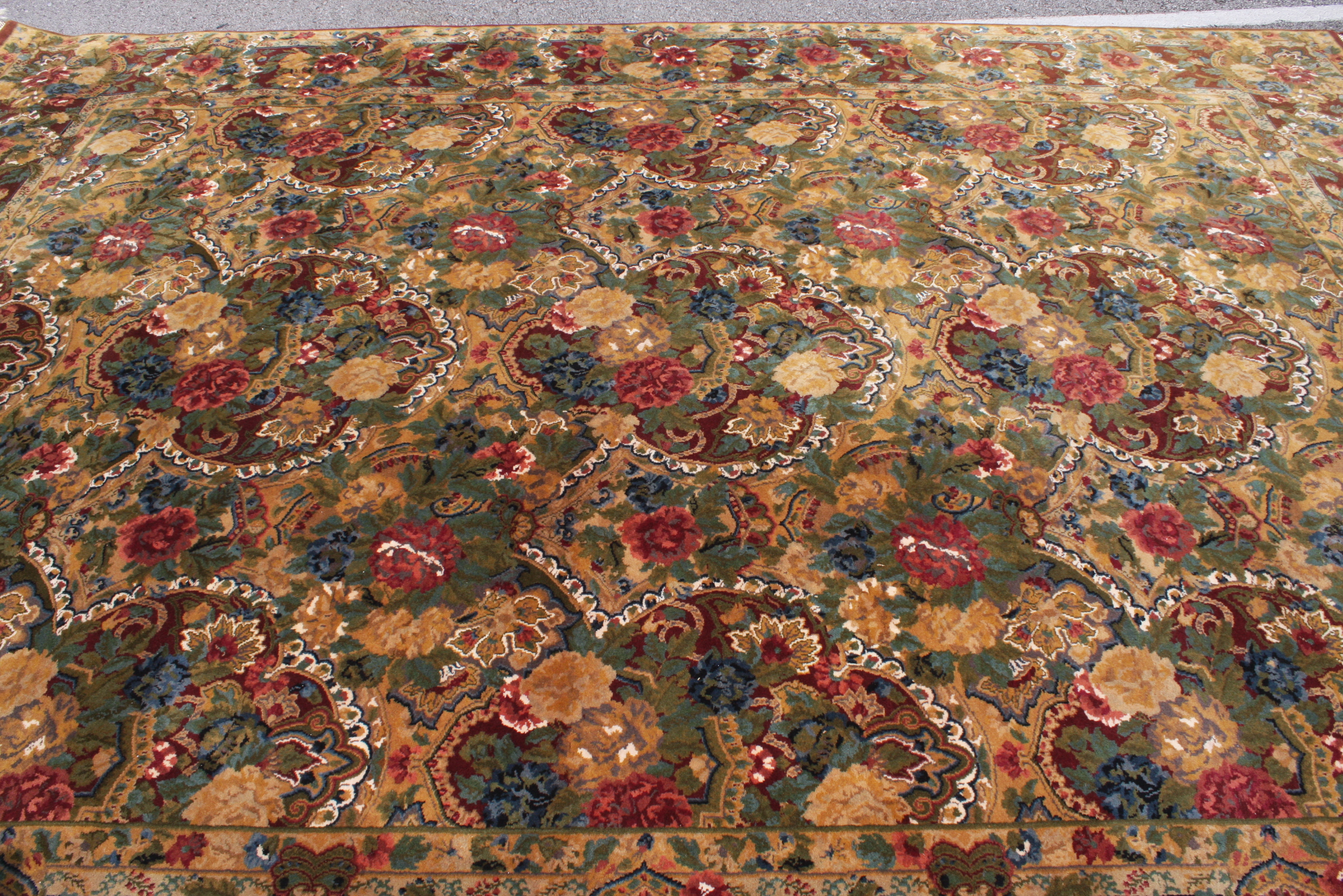 Nasser Rahmanan’s Indian Masterlooms Wool Area Rug