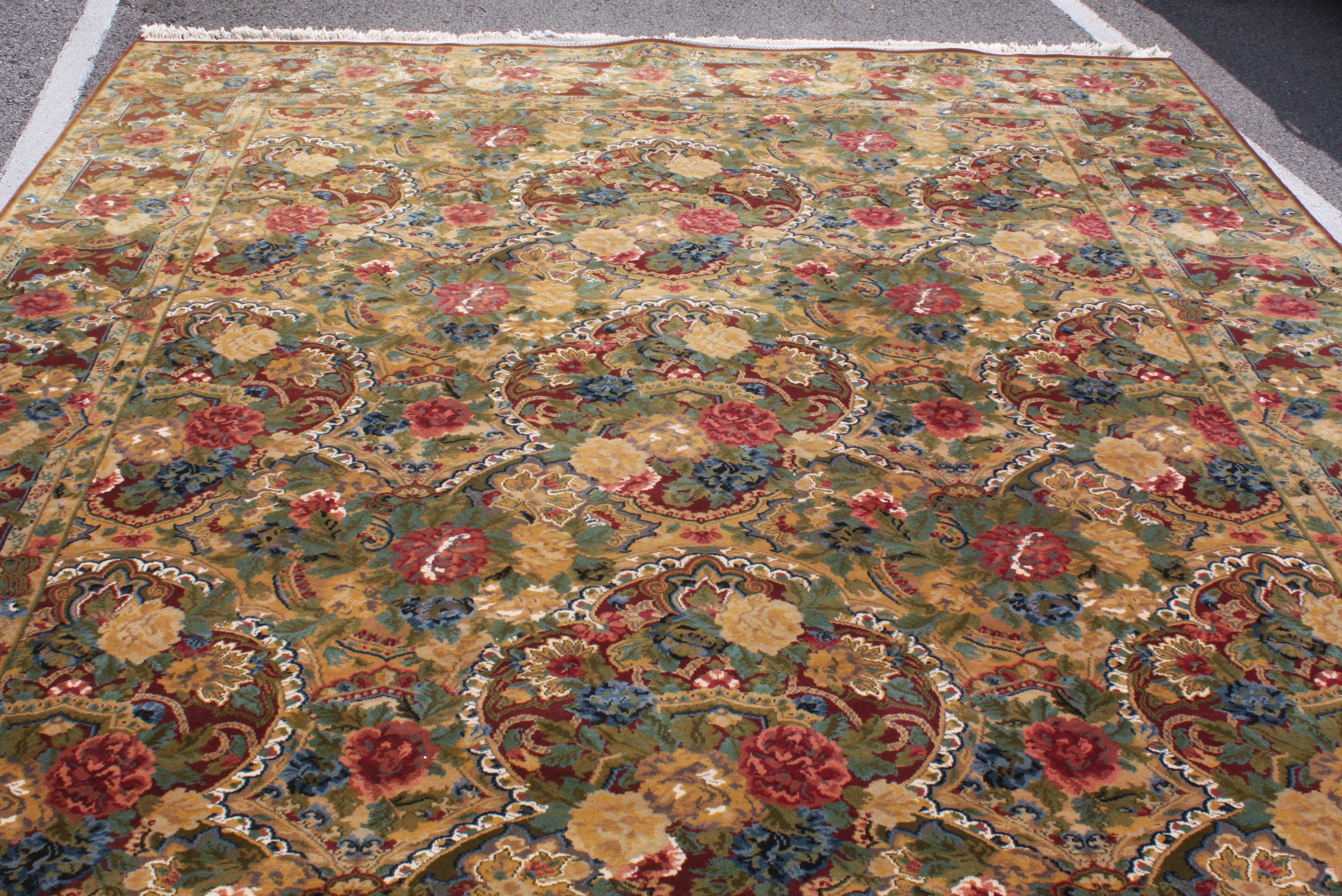Nasser Rahmanan’s Indian Masterlooms Wool Area Rug