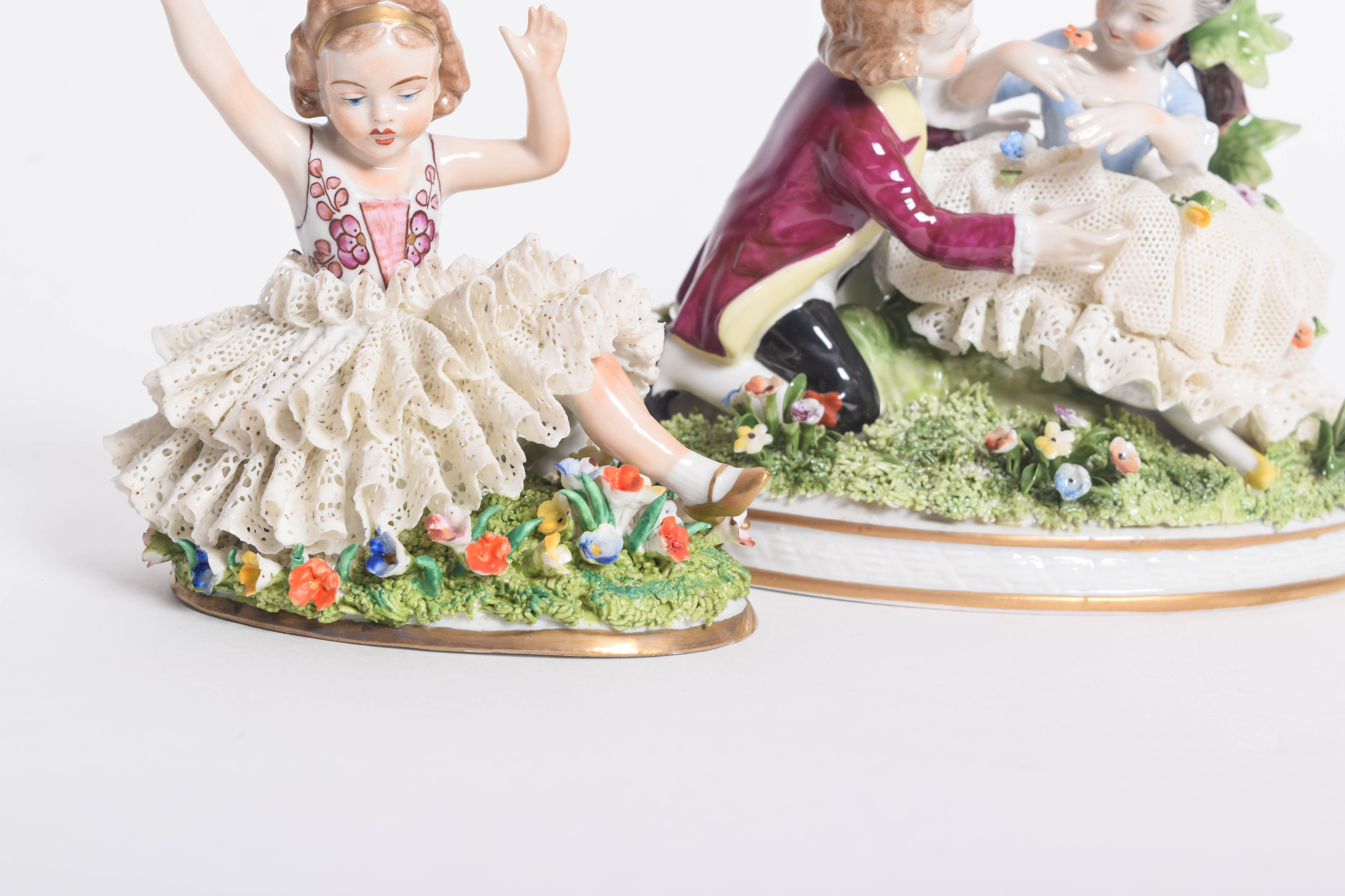 Pair of Porcelain Dresden Lace Figurines