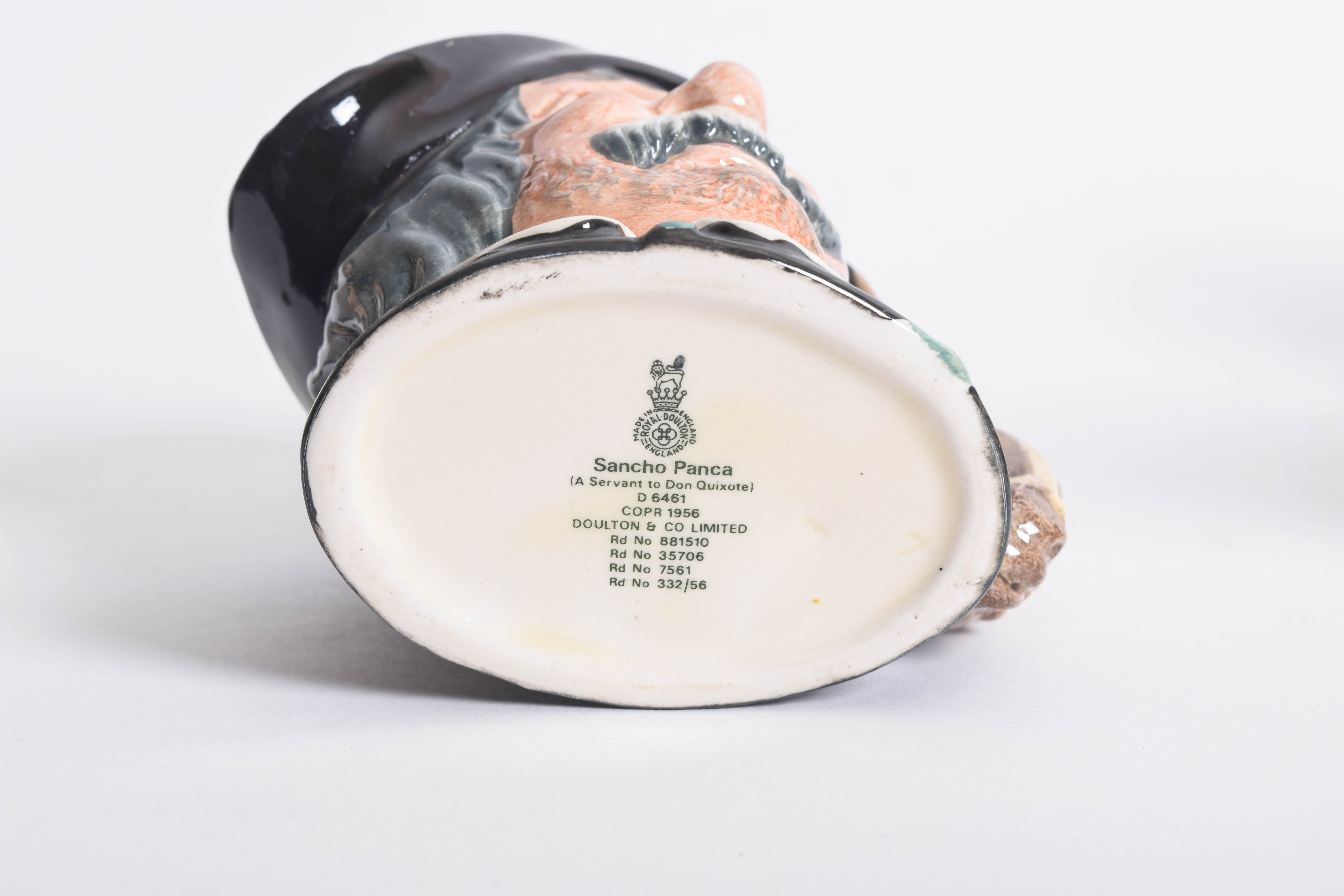 Generous Assortment of  of Royal Doulton Toby Jugs and Character Mugs