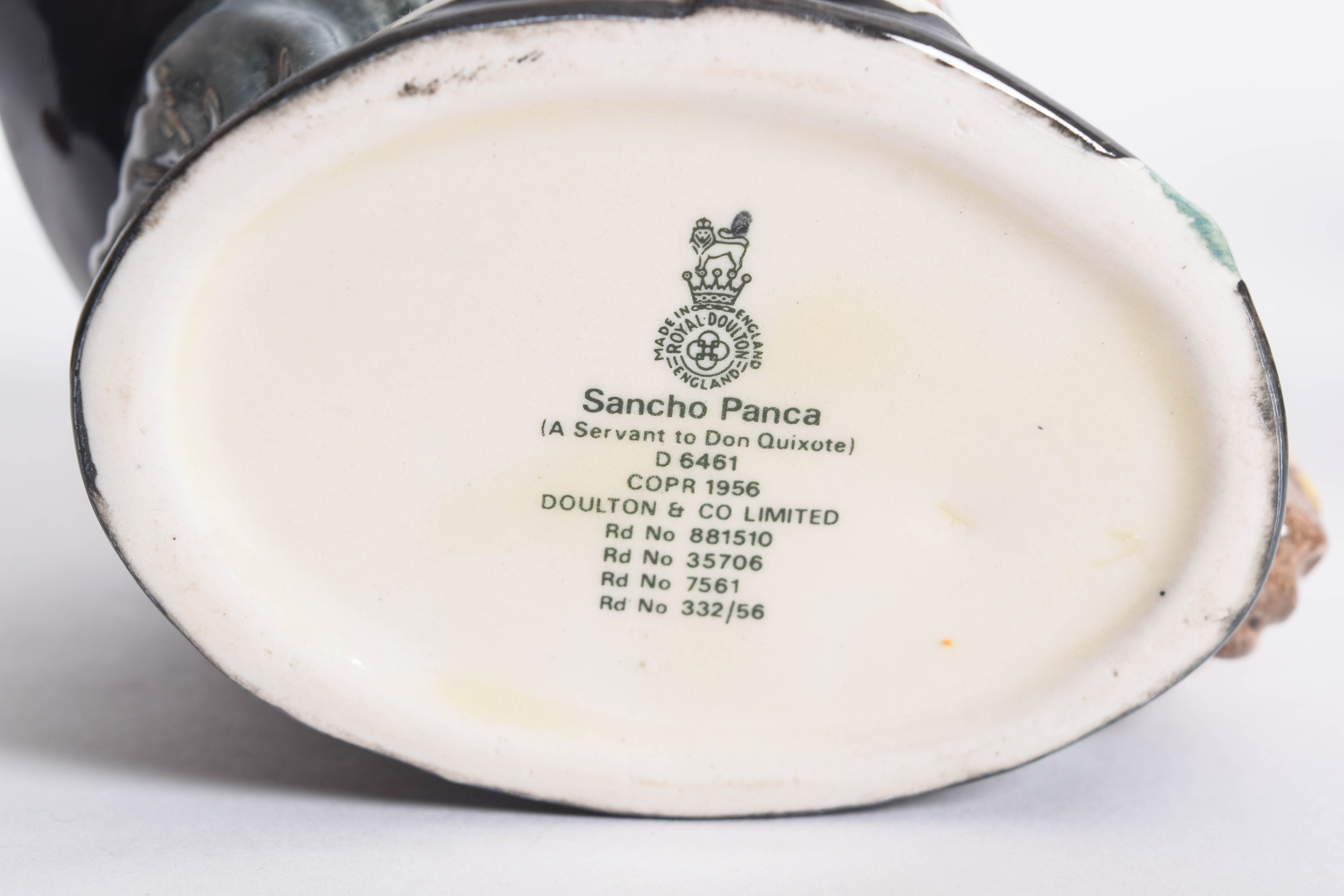 Generous Assortment of  of Royal Doulton Toby Jugs and Character Mugs