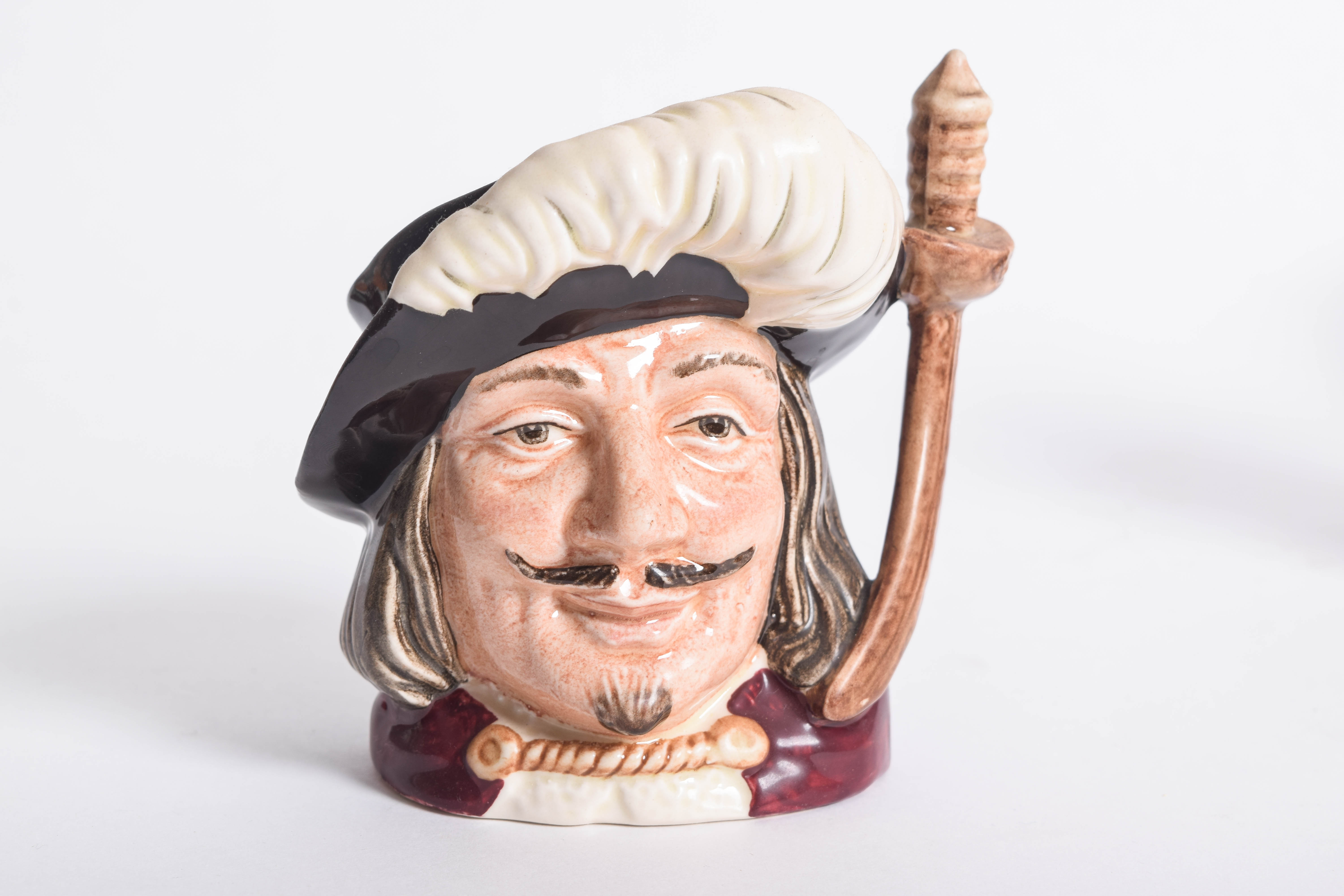 Generous Assortment of  of Royal Doulton Toby Jugs and Character Mugs