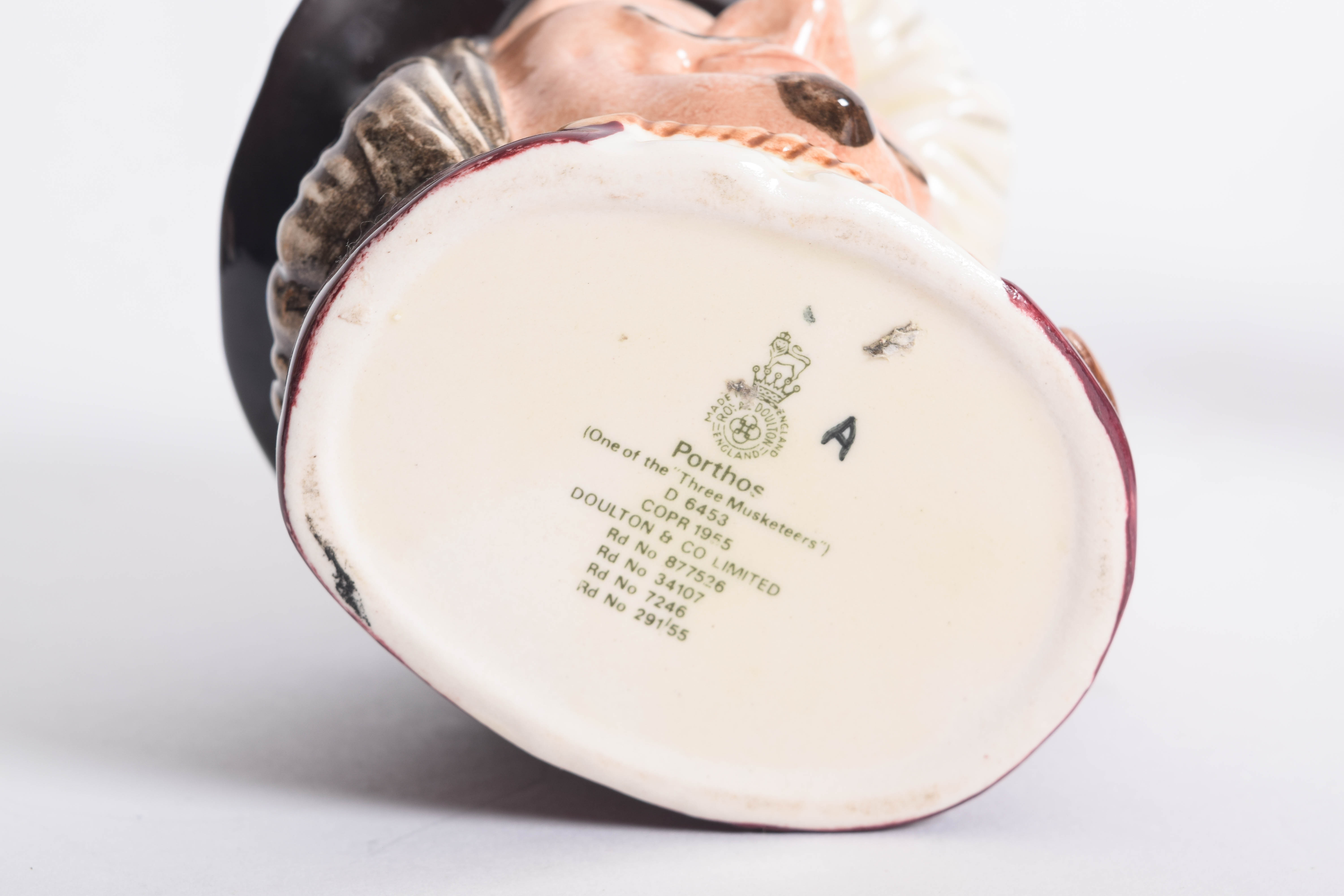 Generous Assortment of  of Royal Doulton Toby Jugs and Character Mugs