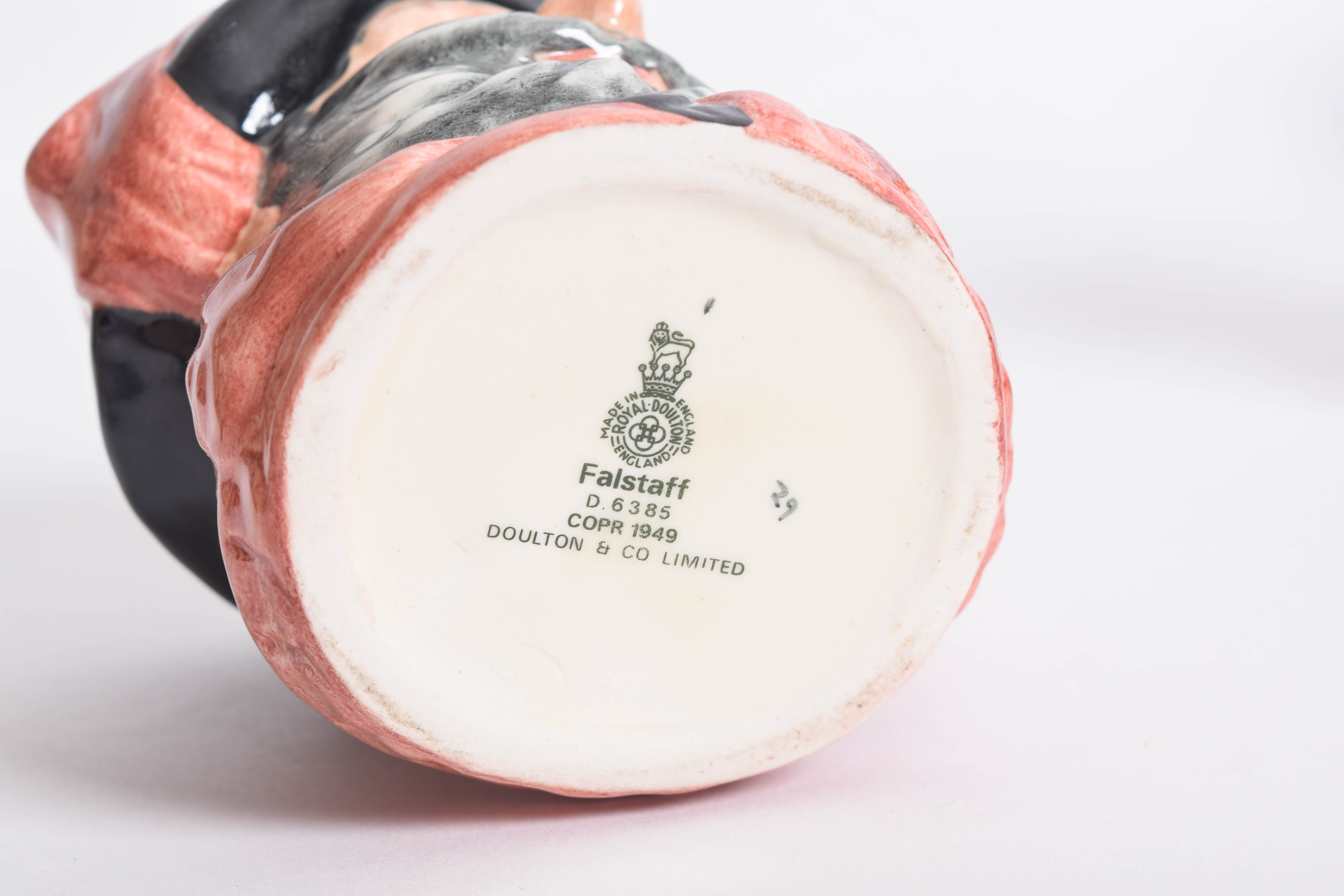 Generous Assortment of  of Royal Doulton Toby Jugs and Character Mugs