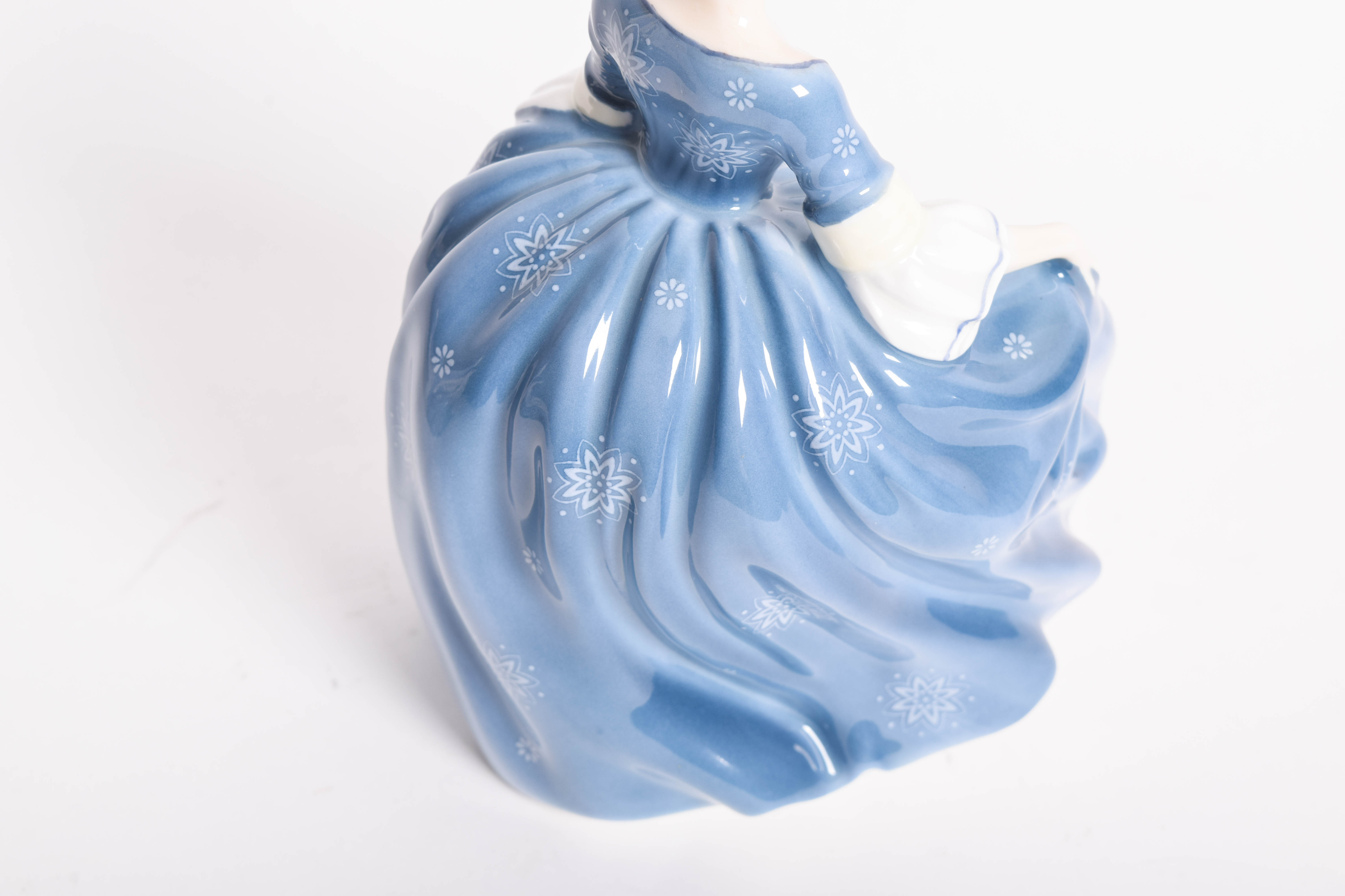 Assortment of Royal Doulton Porcelain Figurines