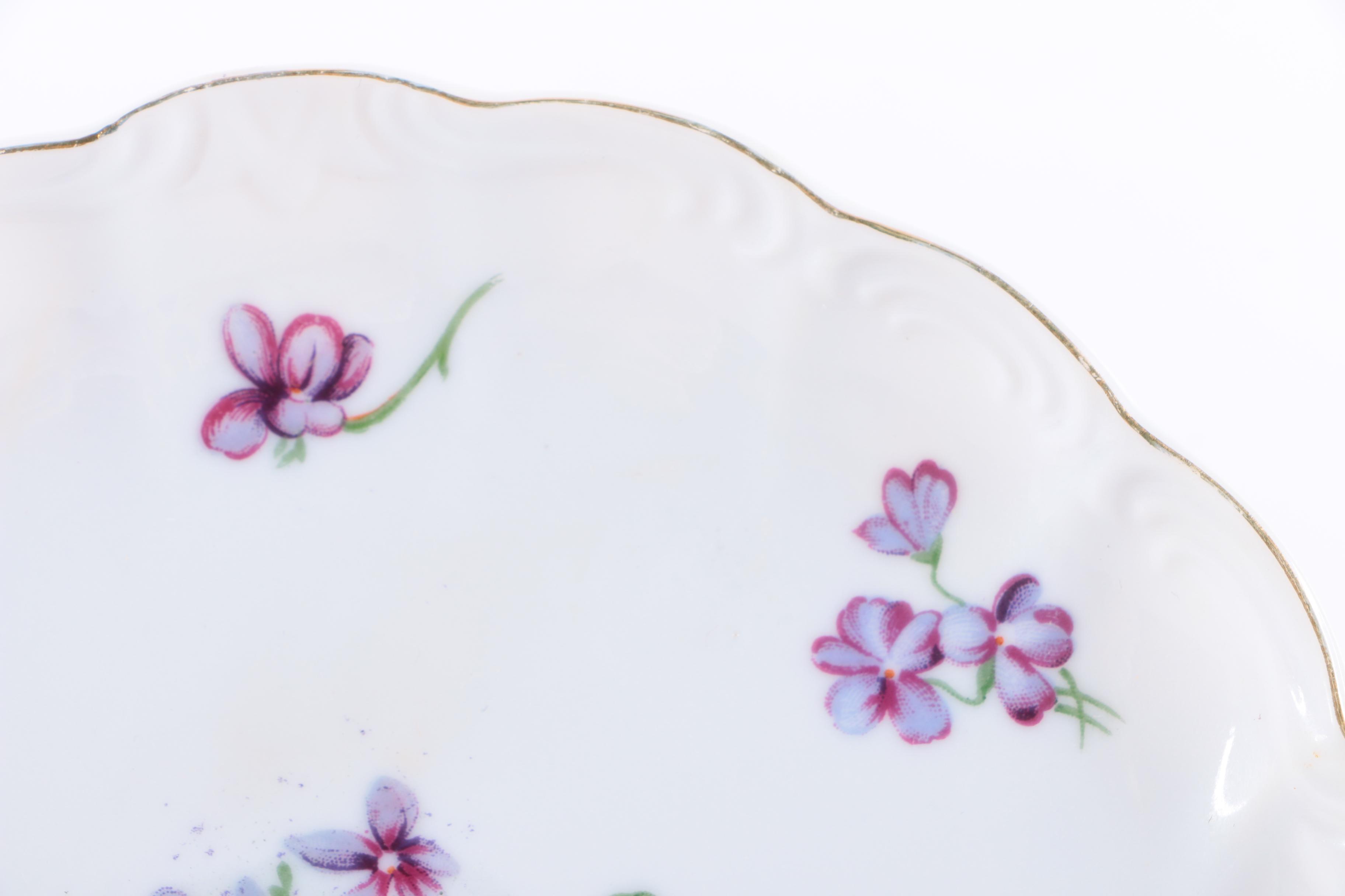 Porcelain Teacups and Snack Plates