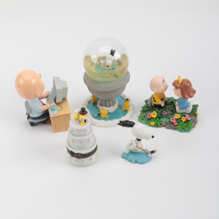 A Collection of "Peanuts" Figurines