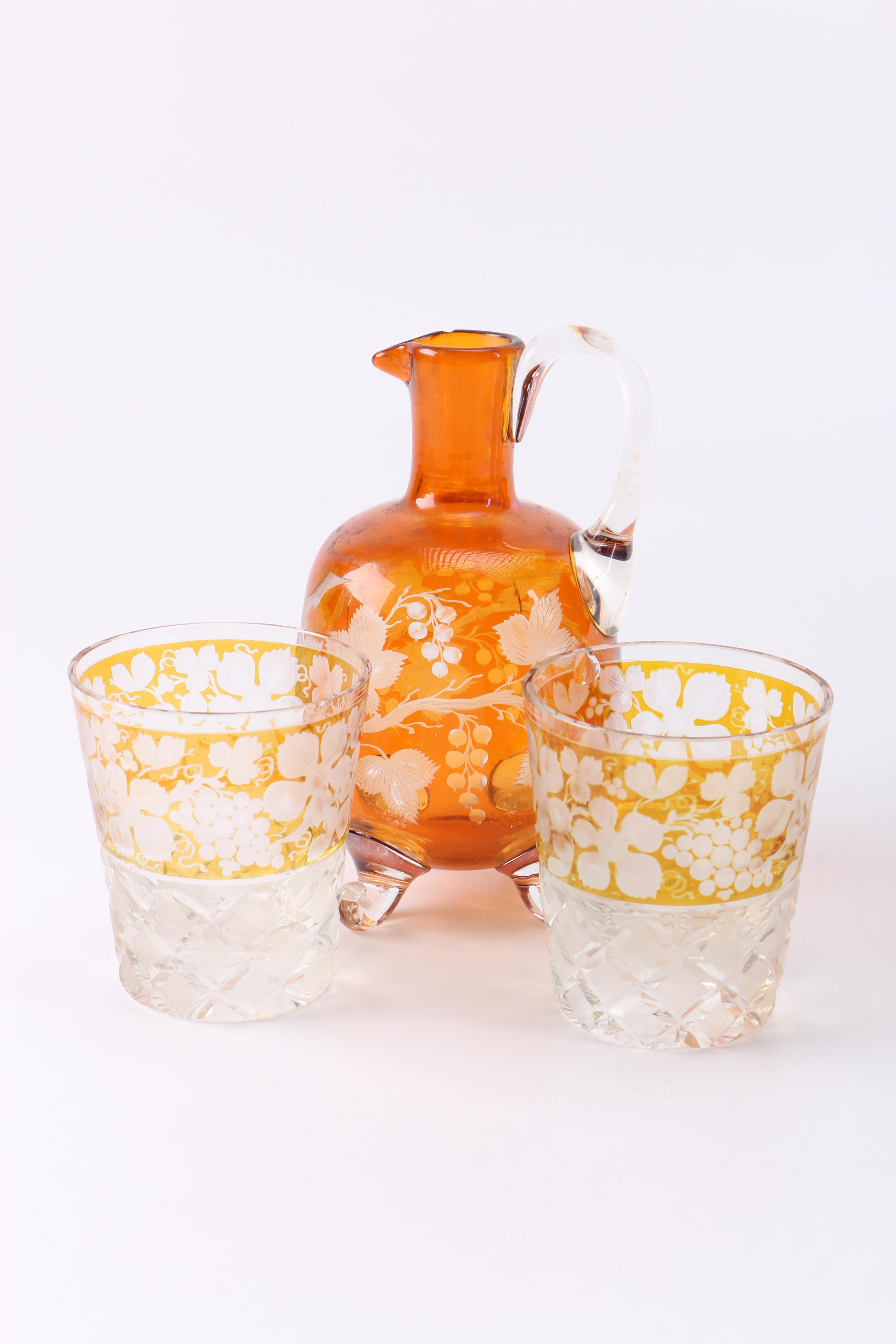 Orange Glass Pitcher and Drinking Glasses