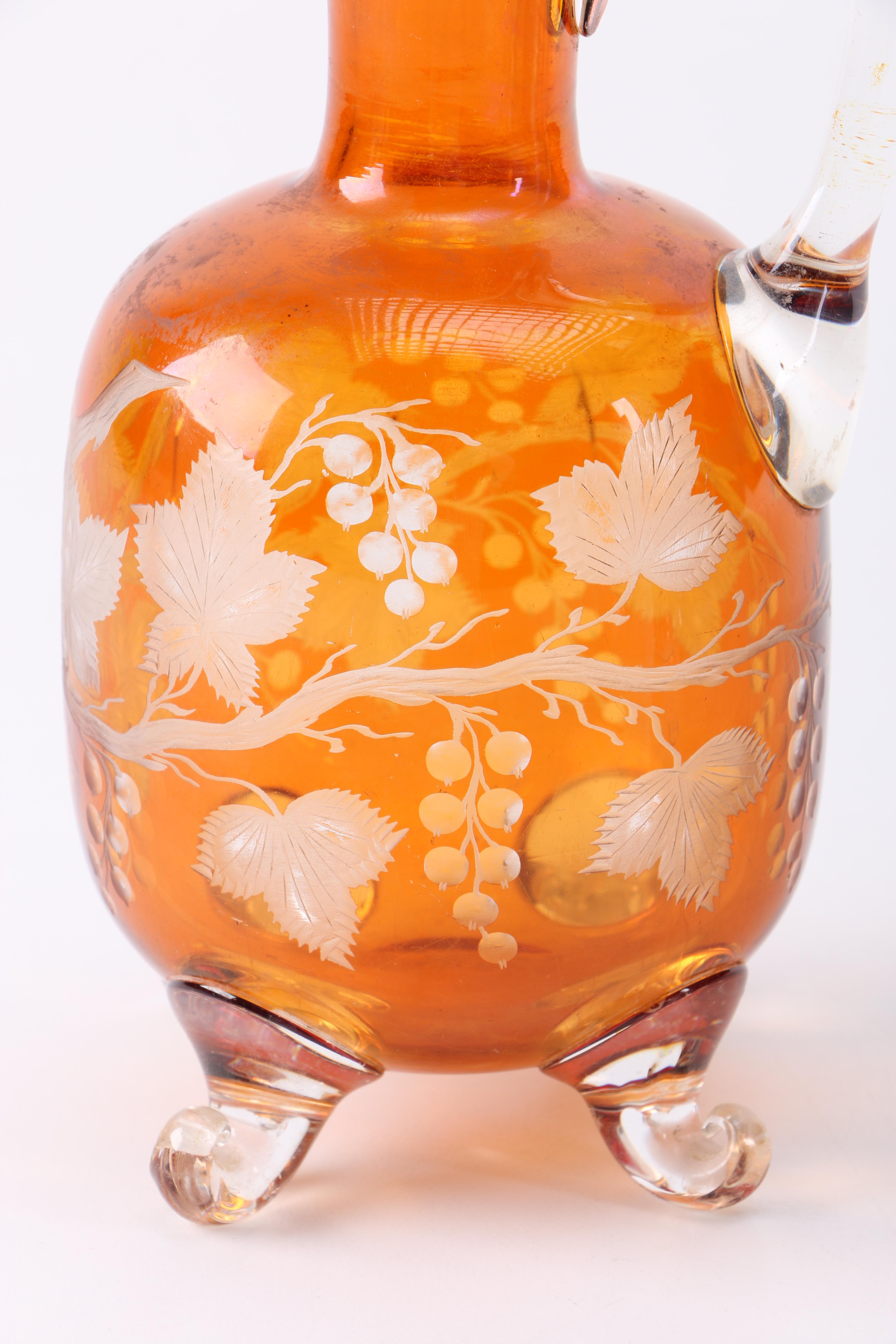 Orange Glass Pitcher and Drinking Glasses