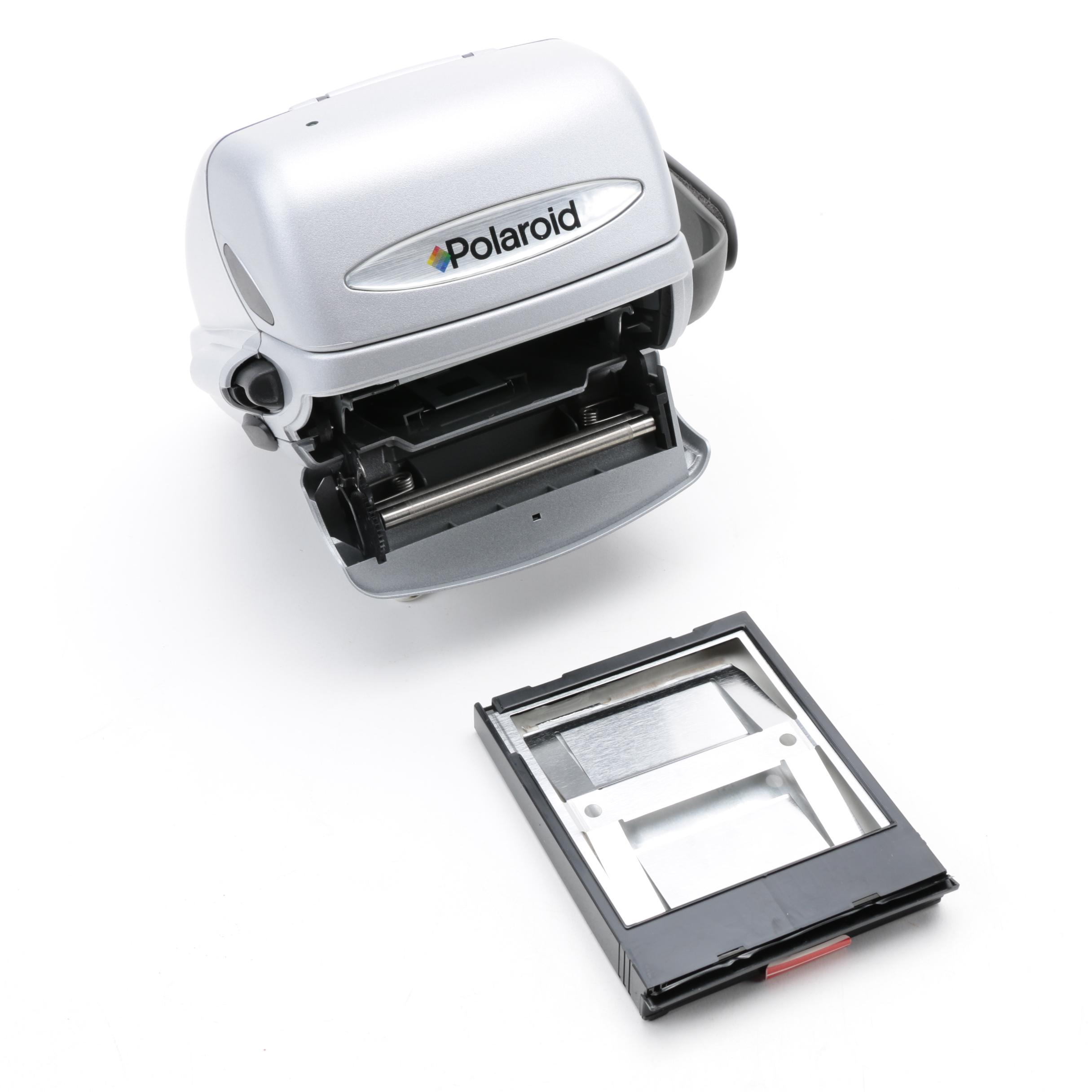 Silver Express Polaroid Camera with Two Boxes of Instant Film