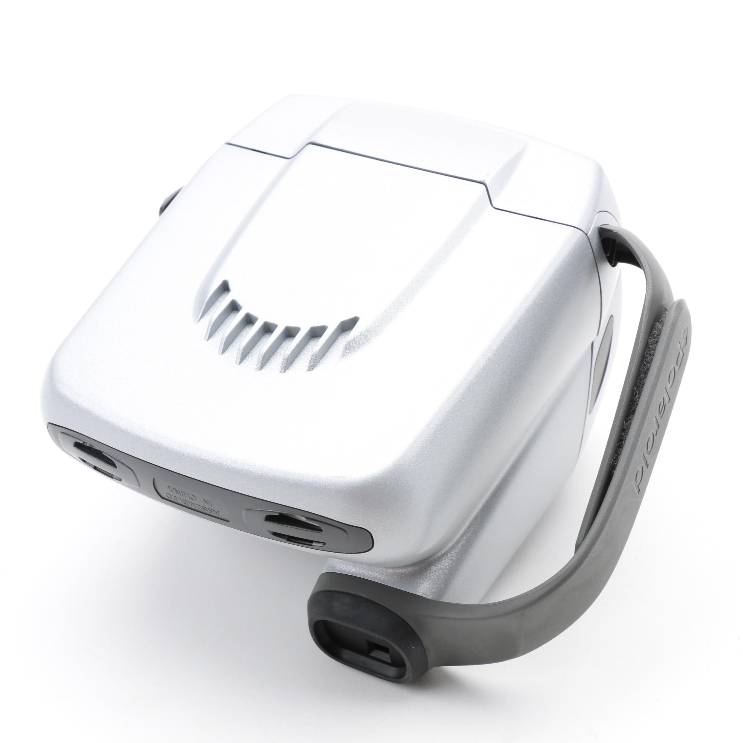 Silver Express Polaroid Camera with Two Boxes of Instant Film