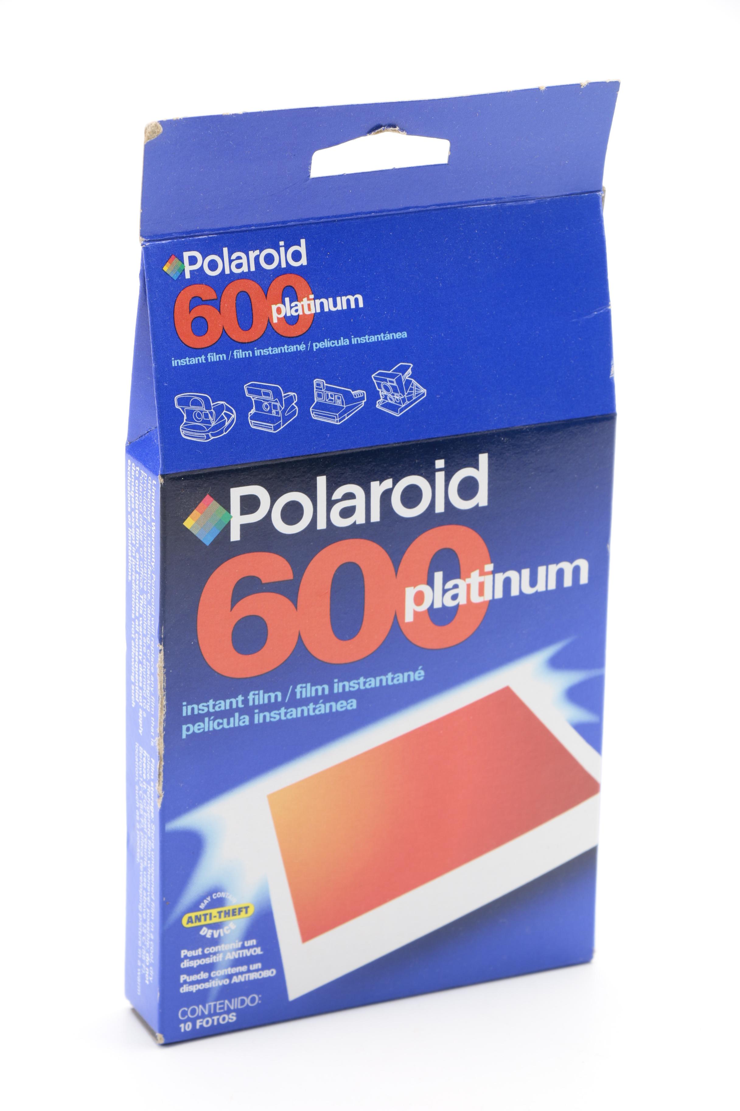 Silver Express Polaroid Camera with Two Boxes of Instant Film