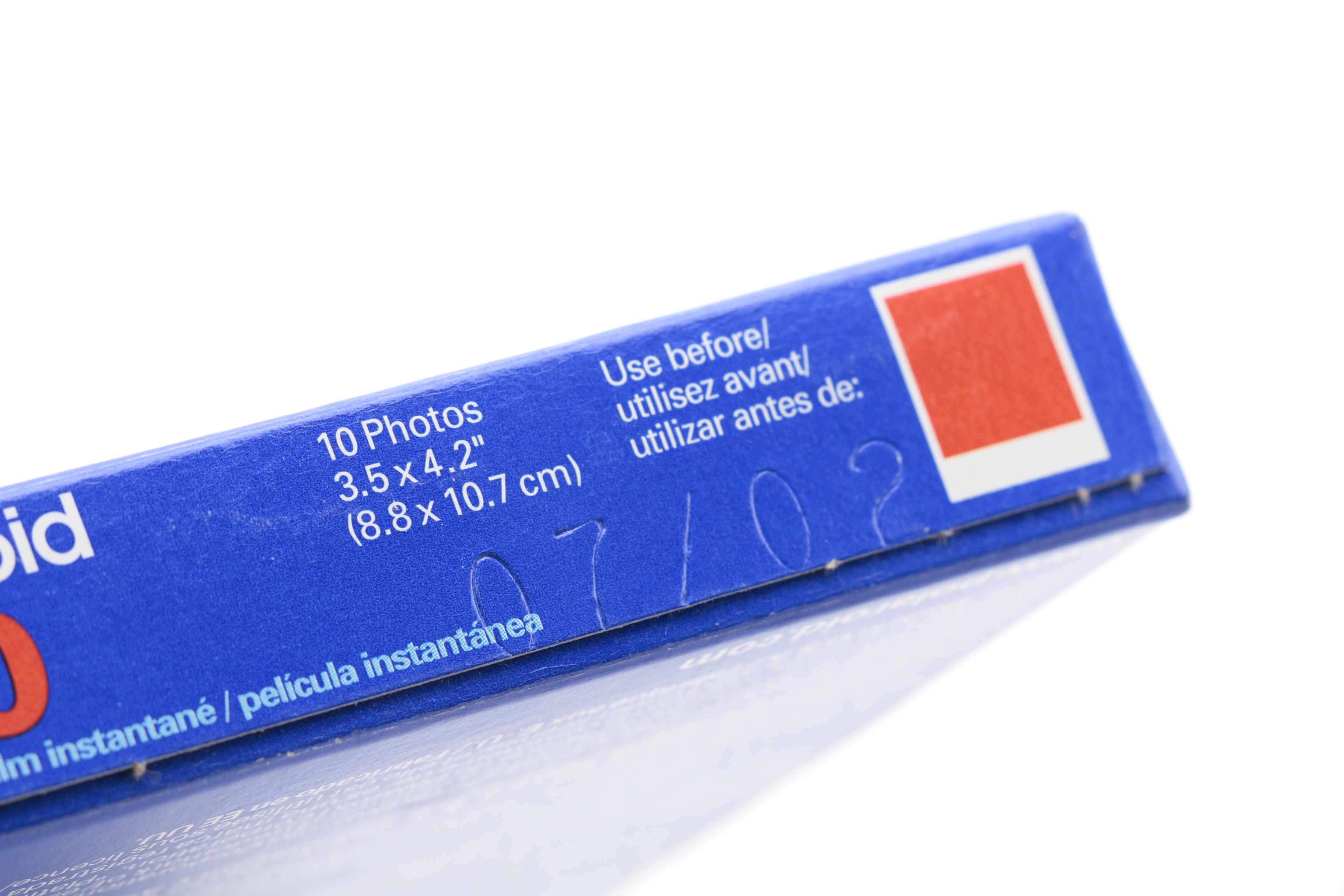 Silver Express Polaroid Camera with Two Boxes of Instant Film