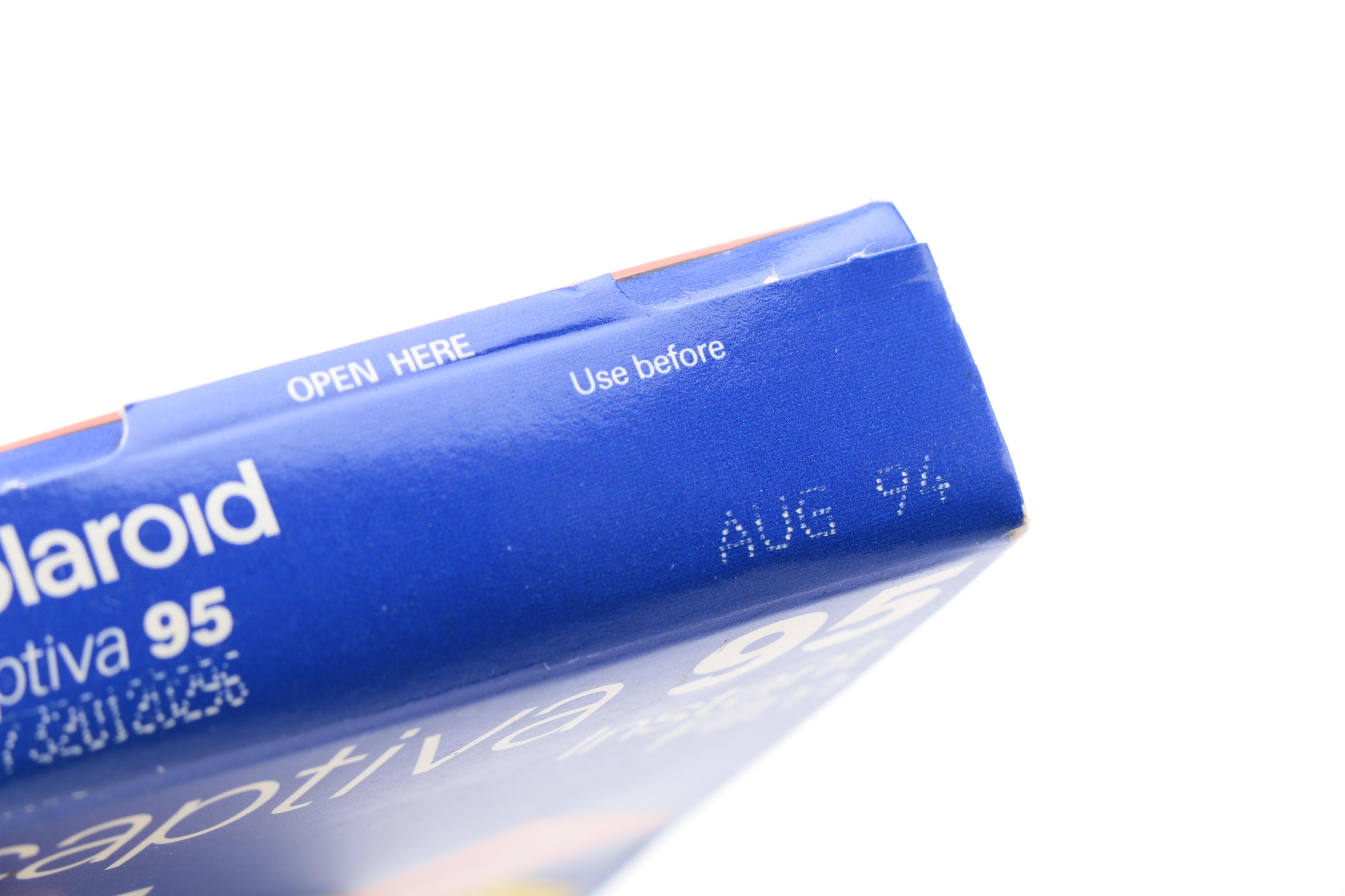 Silver Express Polaroid Camera with Two Boxes of Instant Film