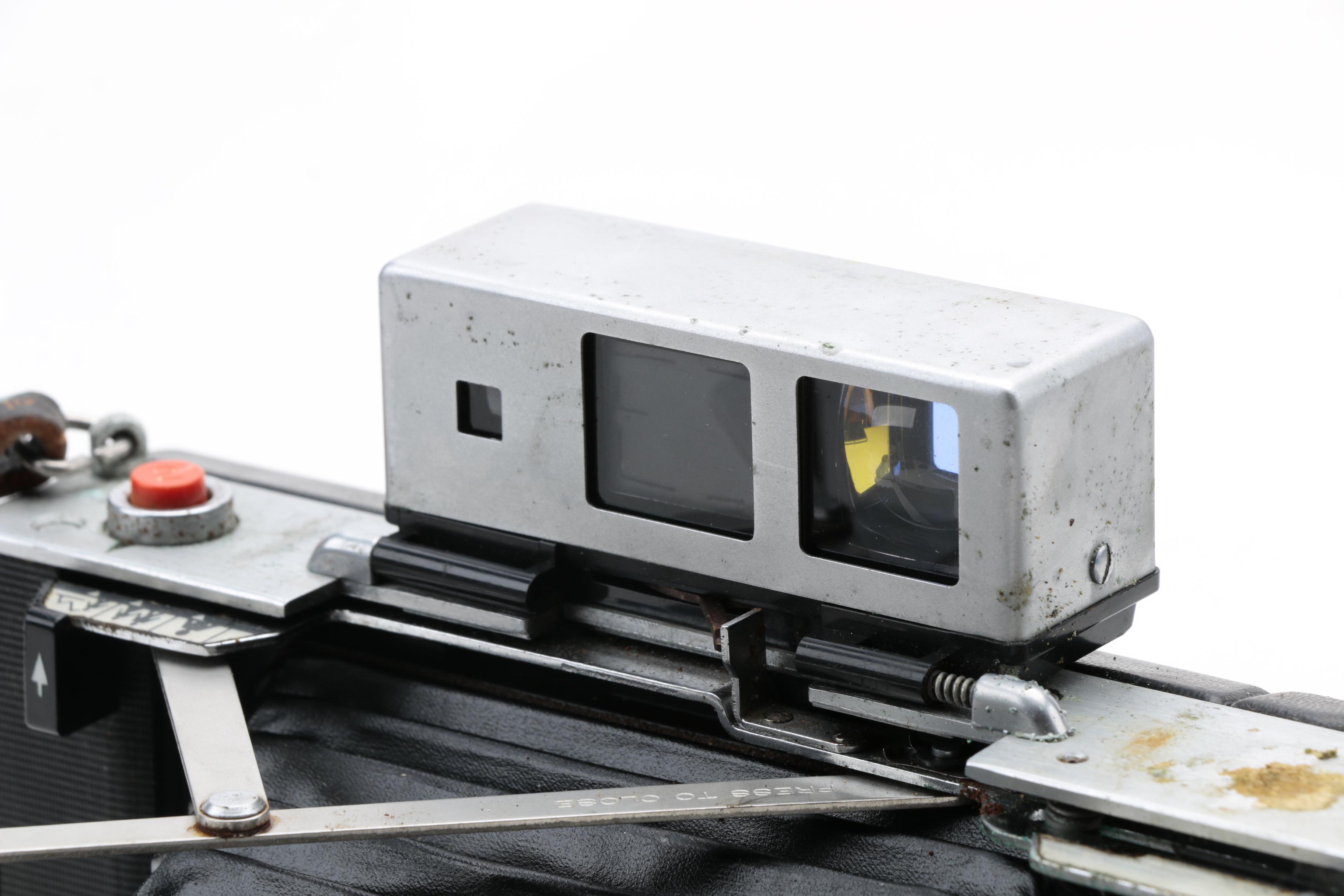 Assortment of Vintage Cameras and Accessories