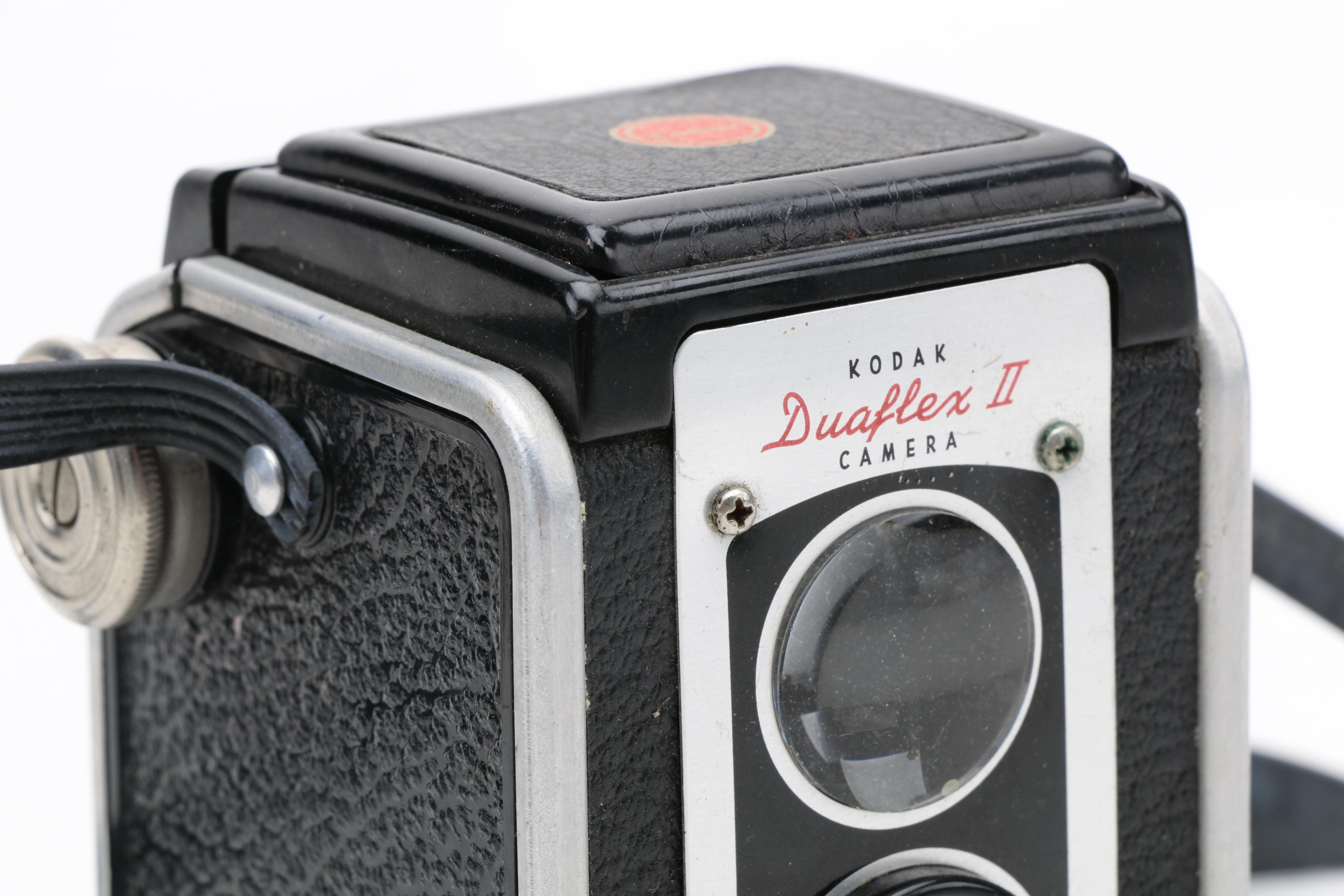 Assortment of Vintage Cameras and Accessories