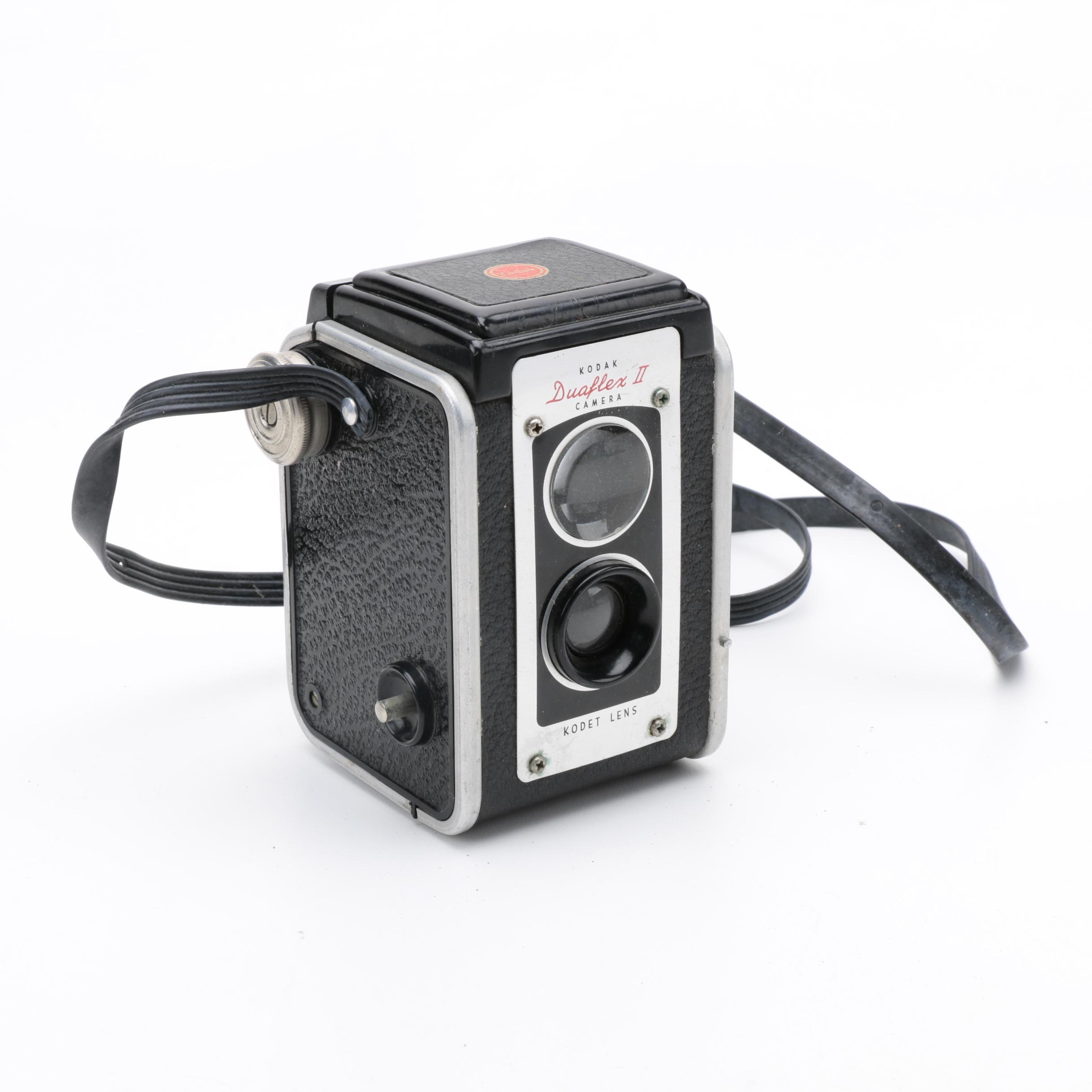 Assortment of Vintage Cameras and Accessories