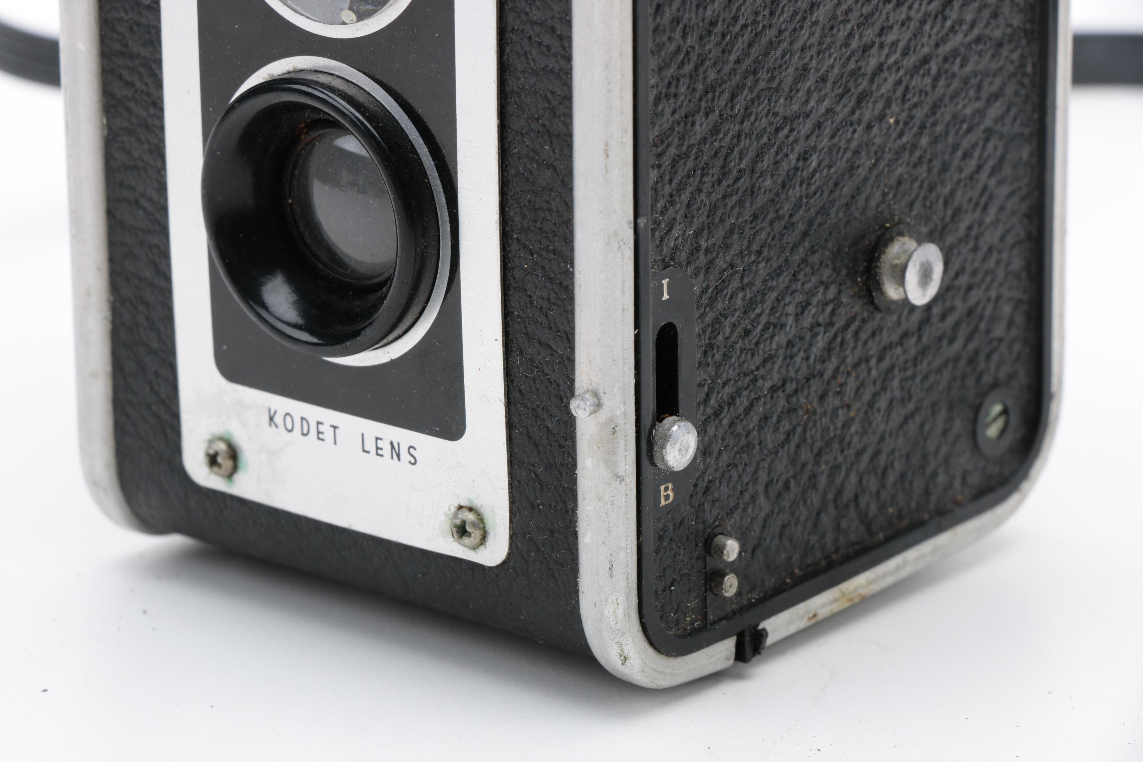 Assortment of Vintage Cameras and Accessories