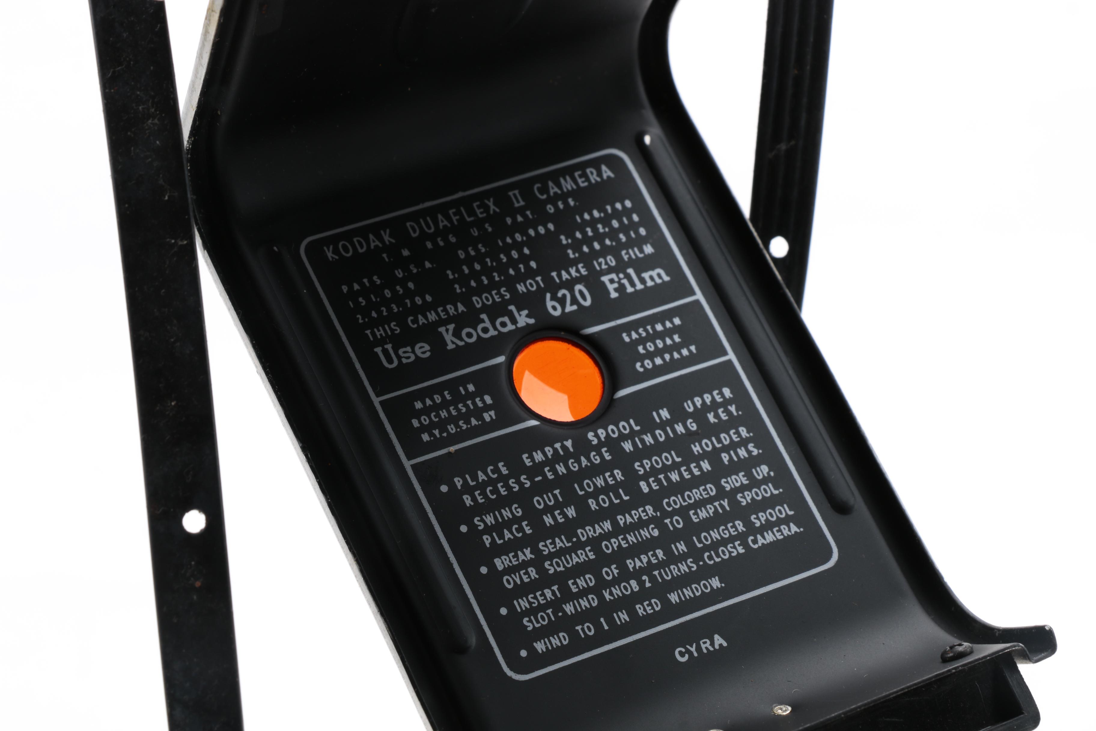 Assortment of Vintage Cameras and Accessories