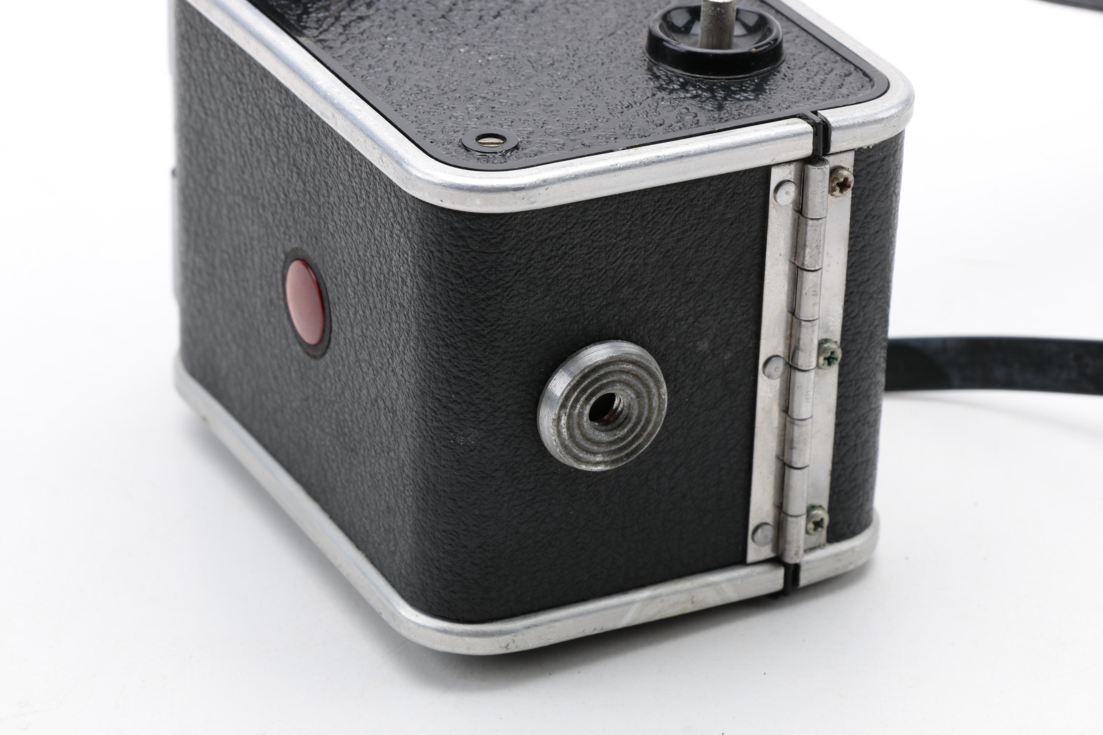 Assortment of Vintage Cameras and Accessories