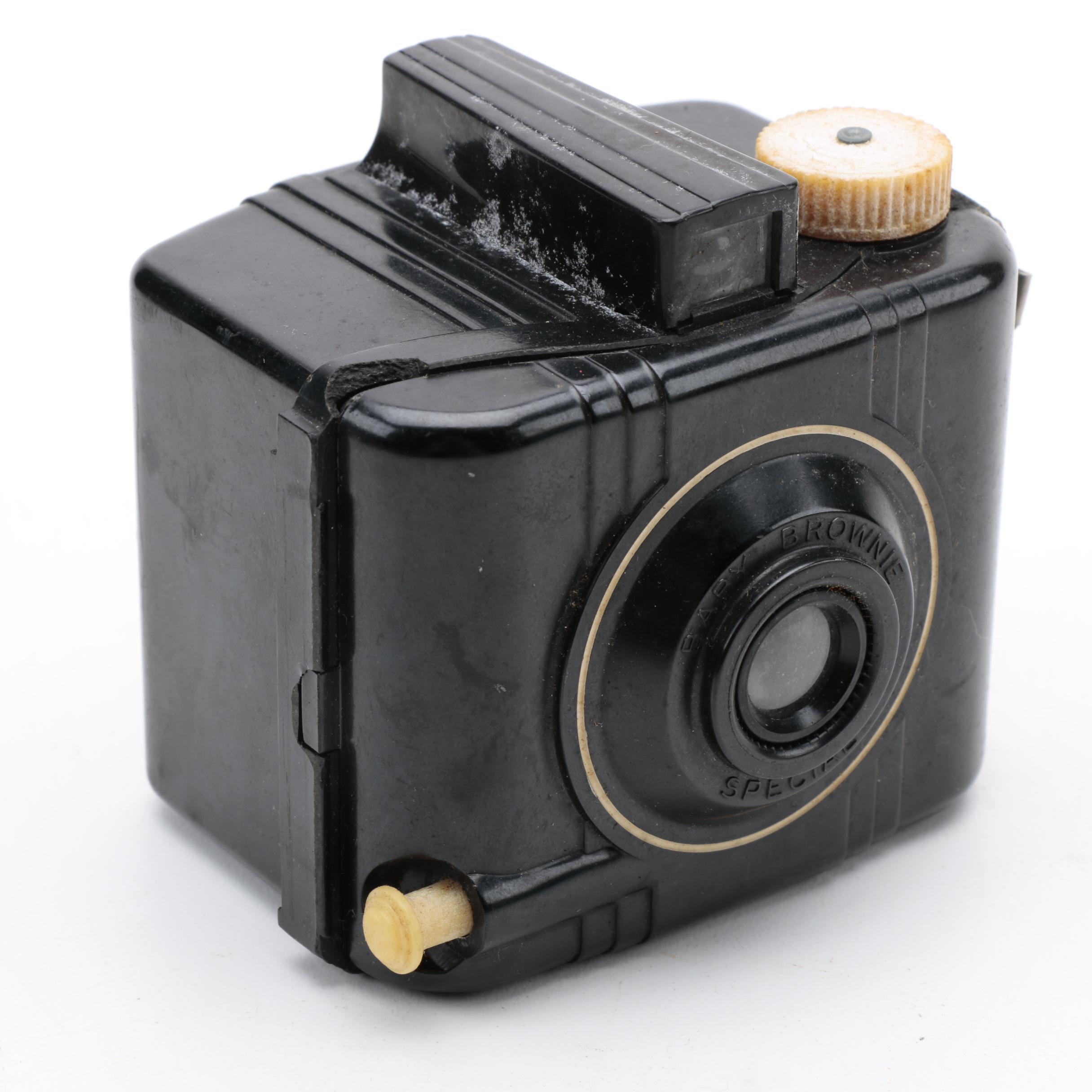 Assortment of Vintage Cameras and Accessories