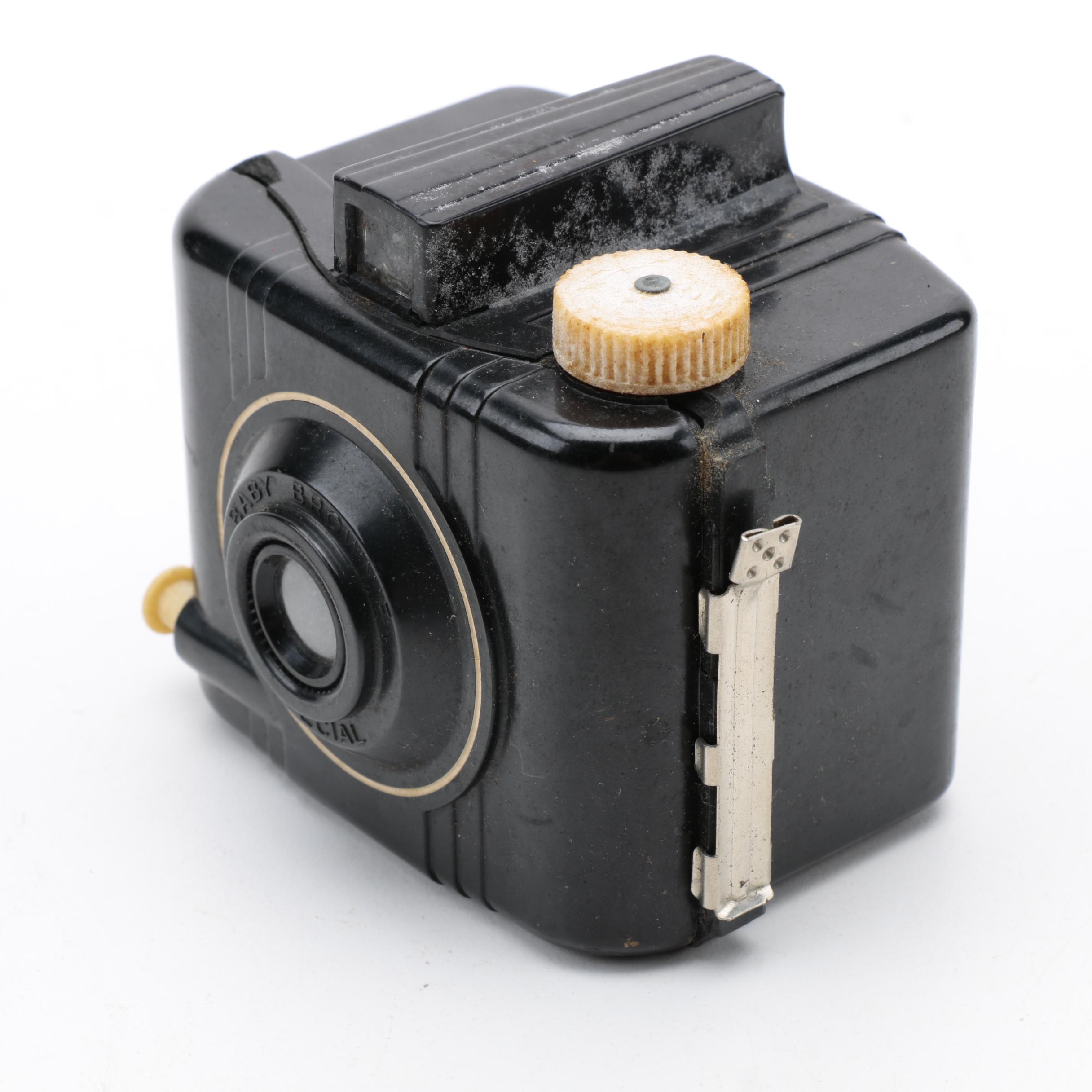 Assortment of Vintage Cameras and Accessories