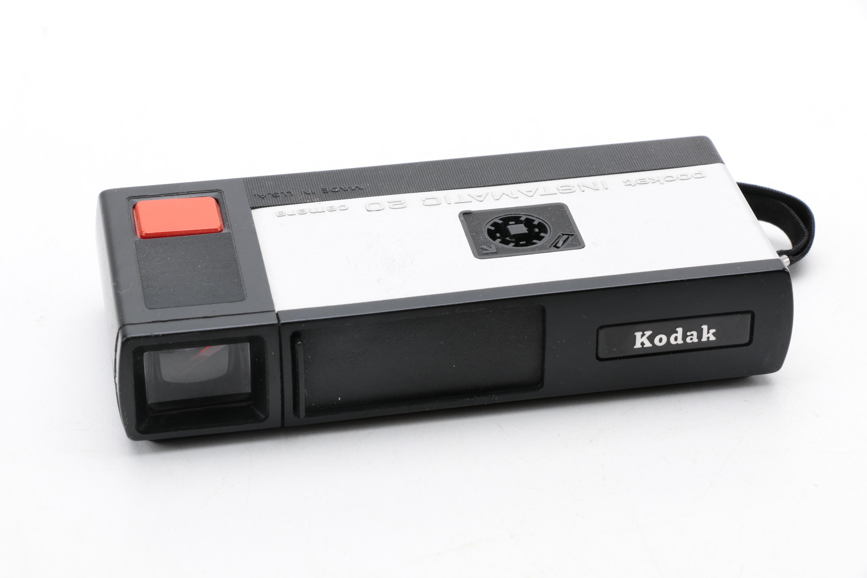 Assortment of Vintage Cameras and Accessories