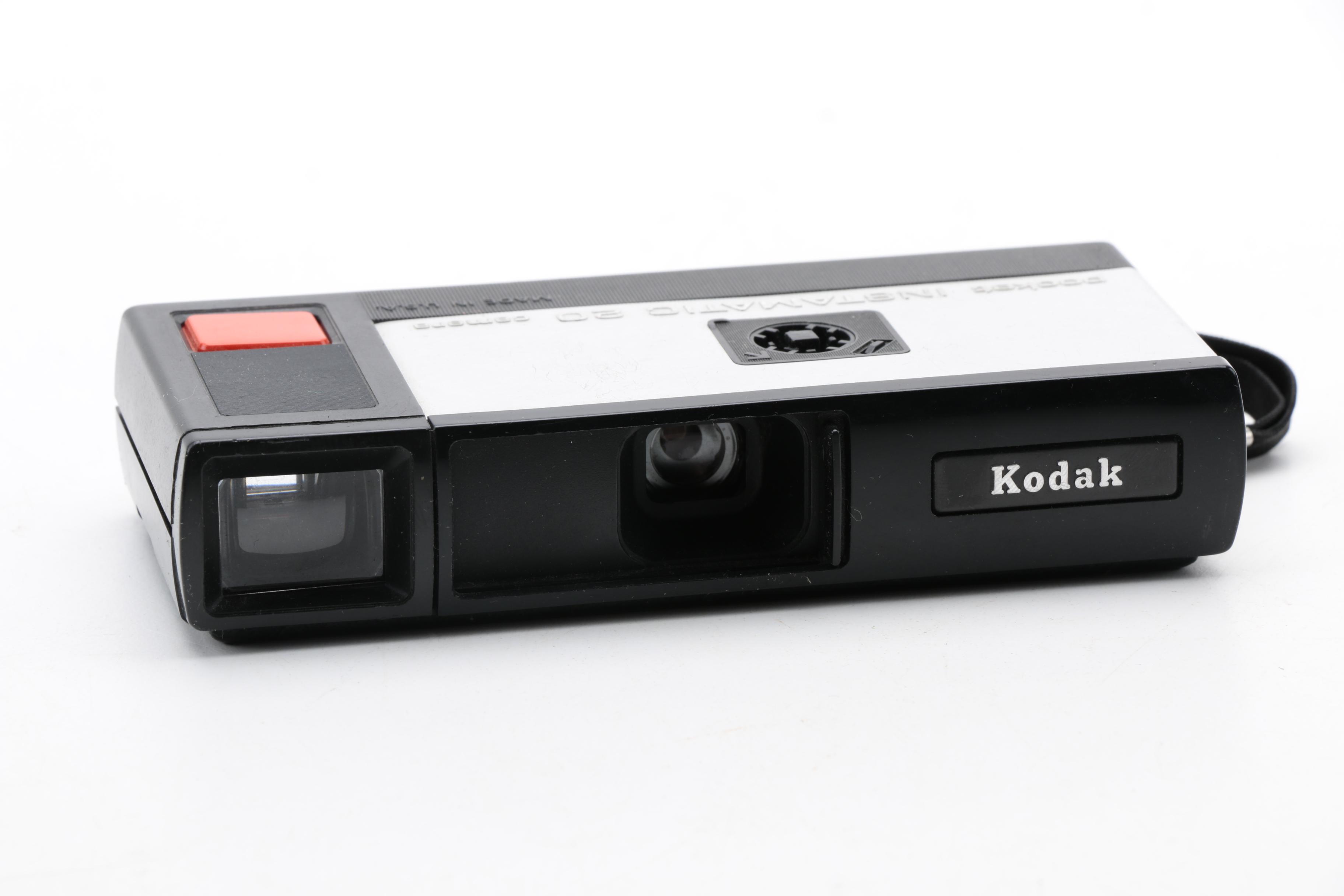 Assortment of Vintage Cameras and Accessories