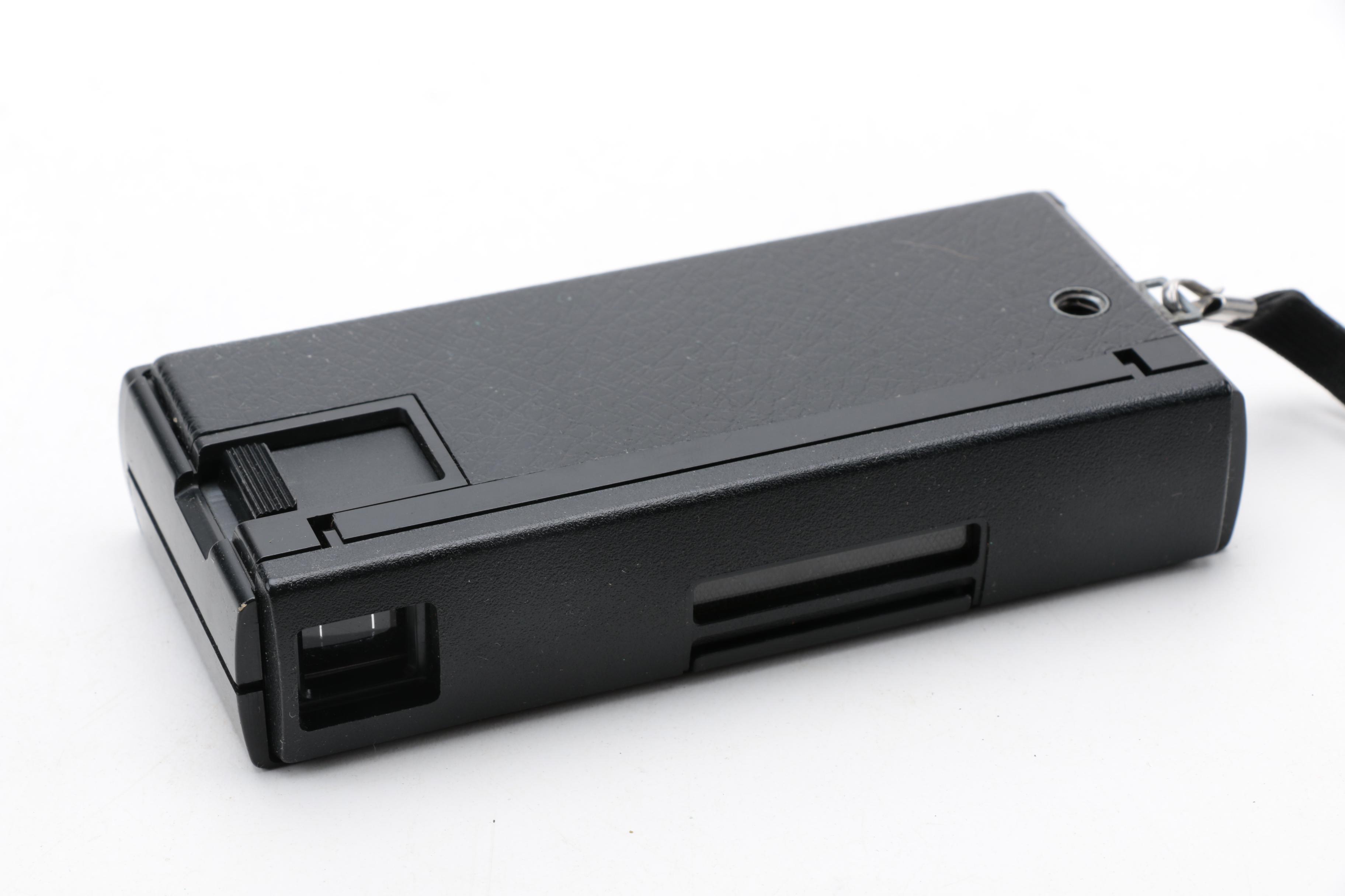 Assortment of Vintage Cameras and Accessories