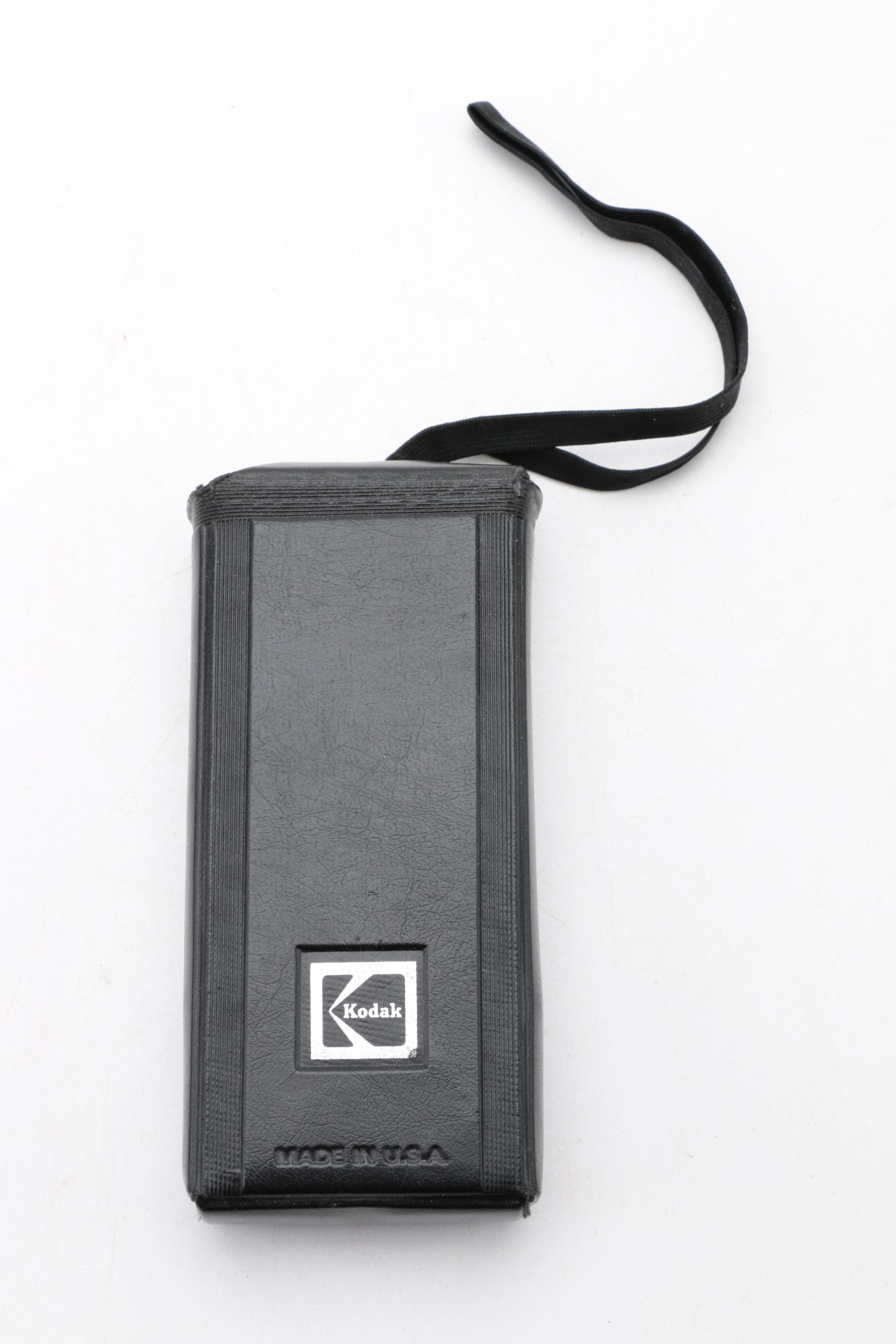 Assortment of Vintage Cameras and Accessories