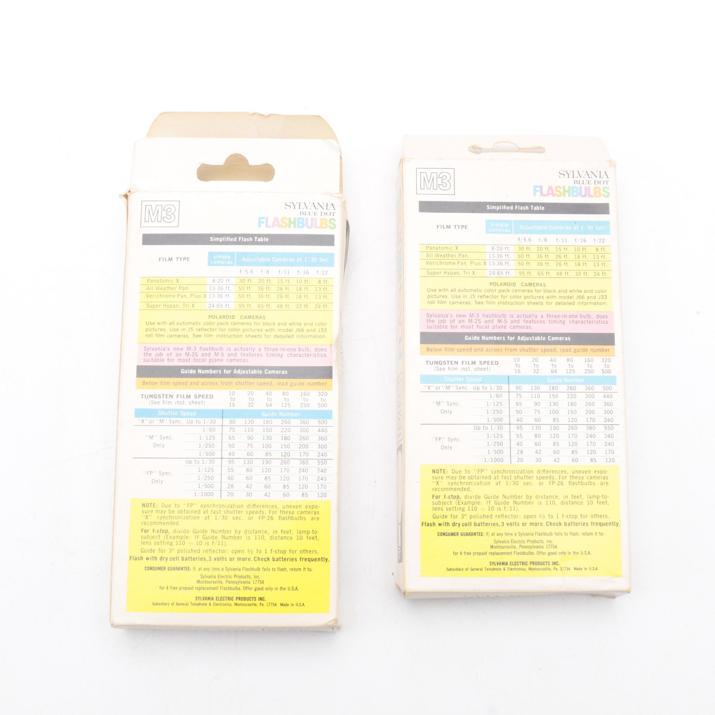 Assortment of Vintage Cameras and Accessories