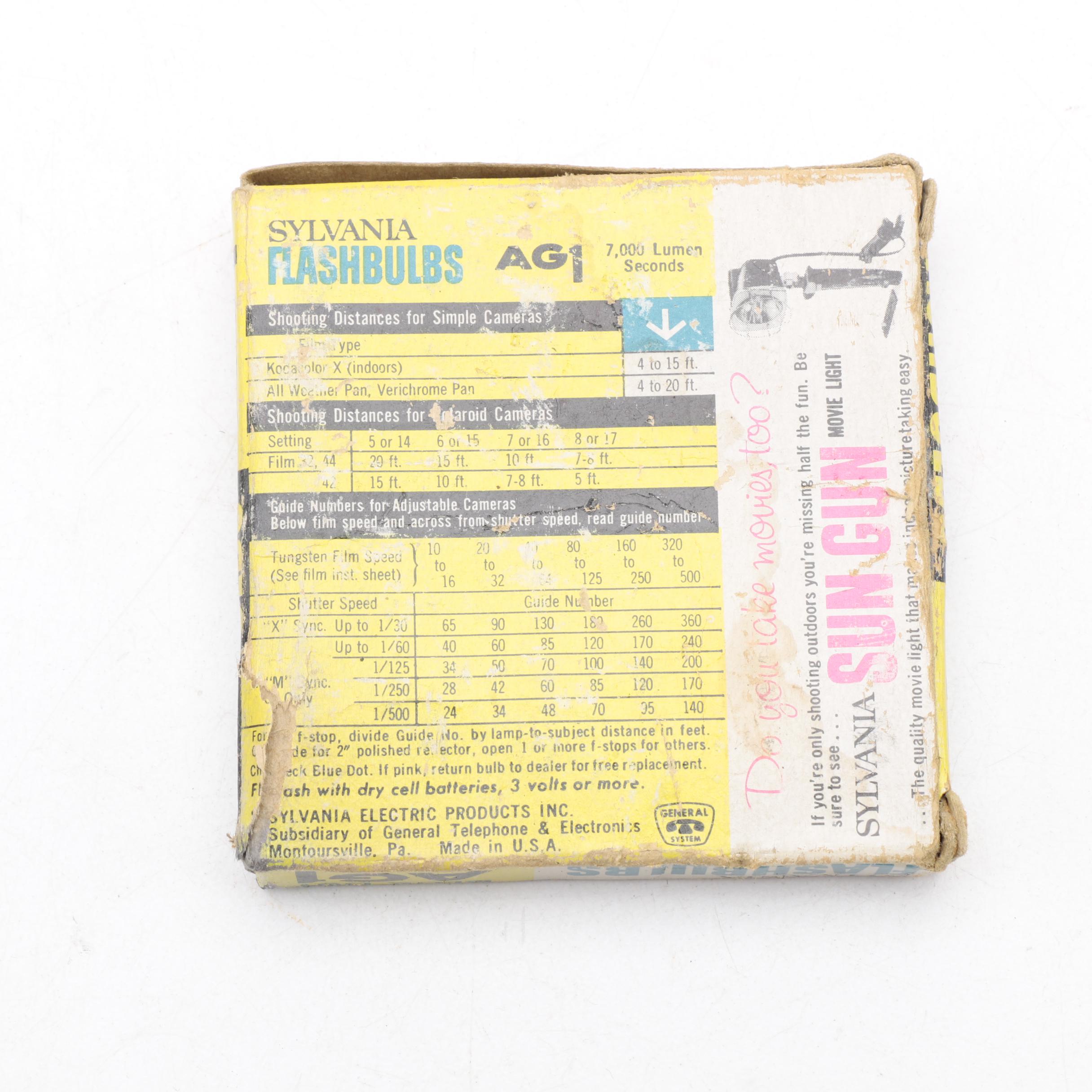 Assortment of Vintage Cameras and Accessories