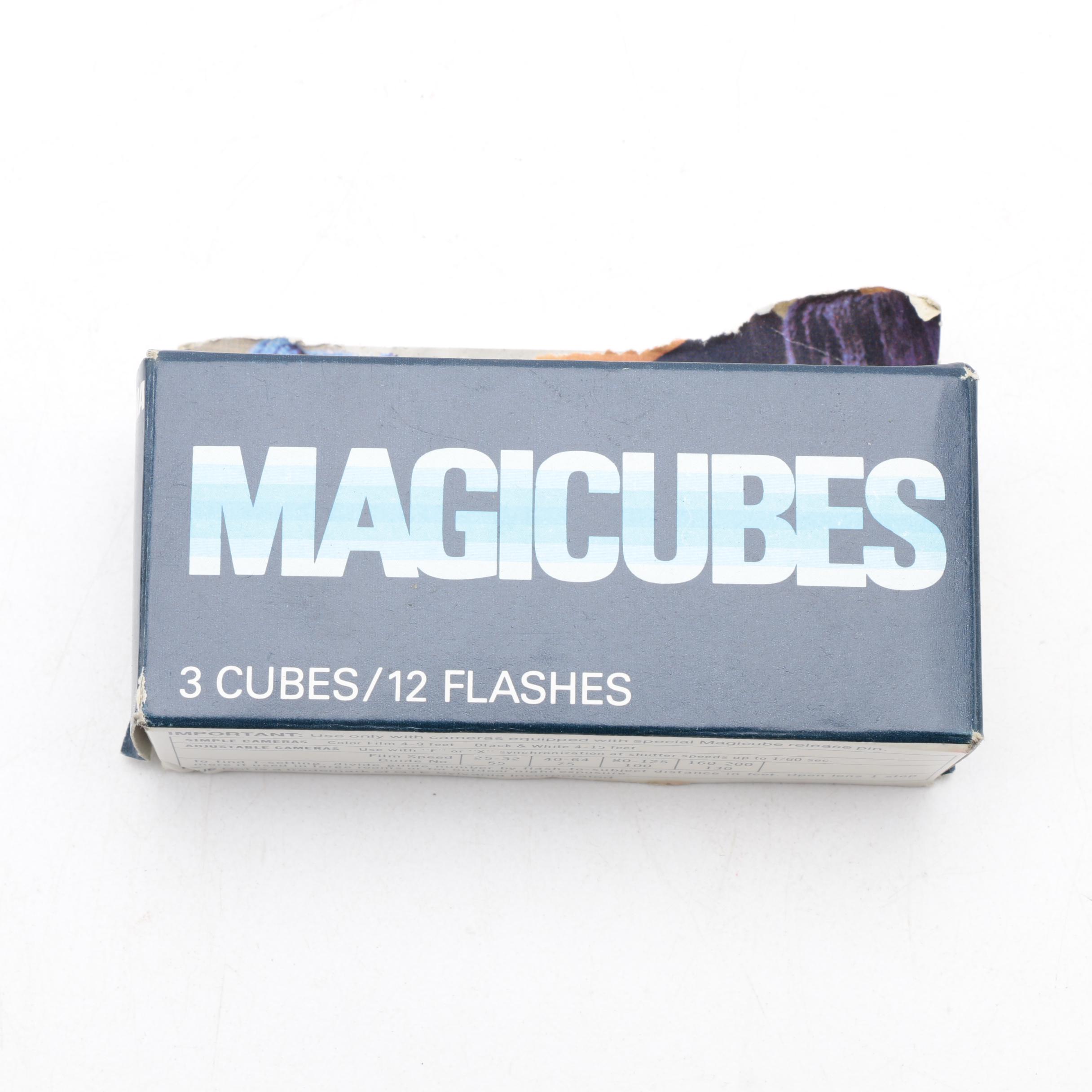 Assortment of Vintage Cameras and Accessories