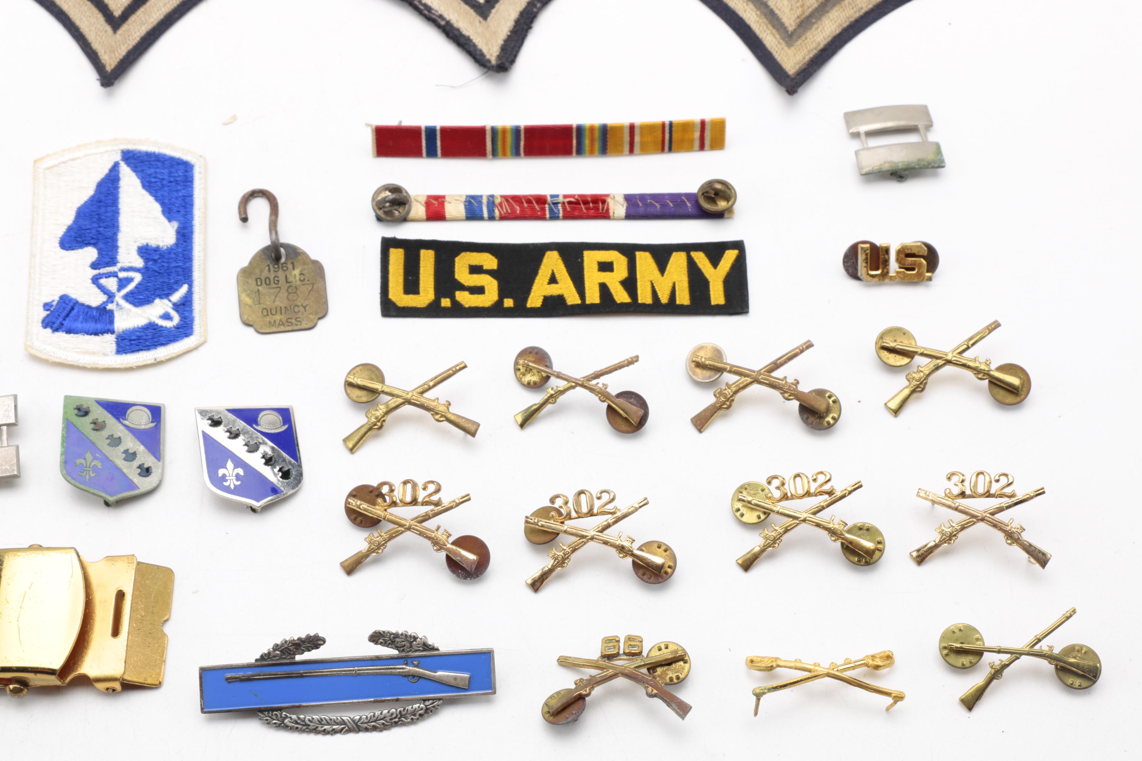 Assortment of Military Pins and Patches