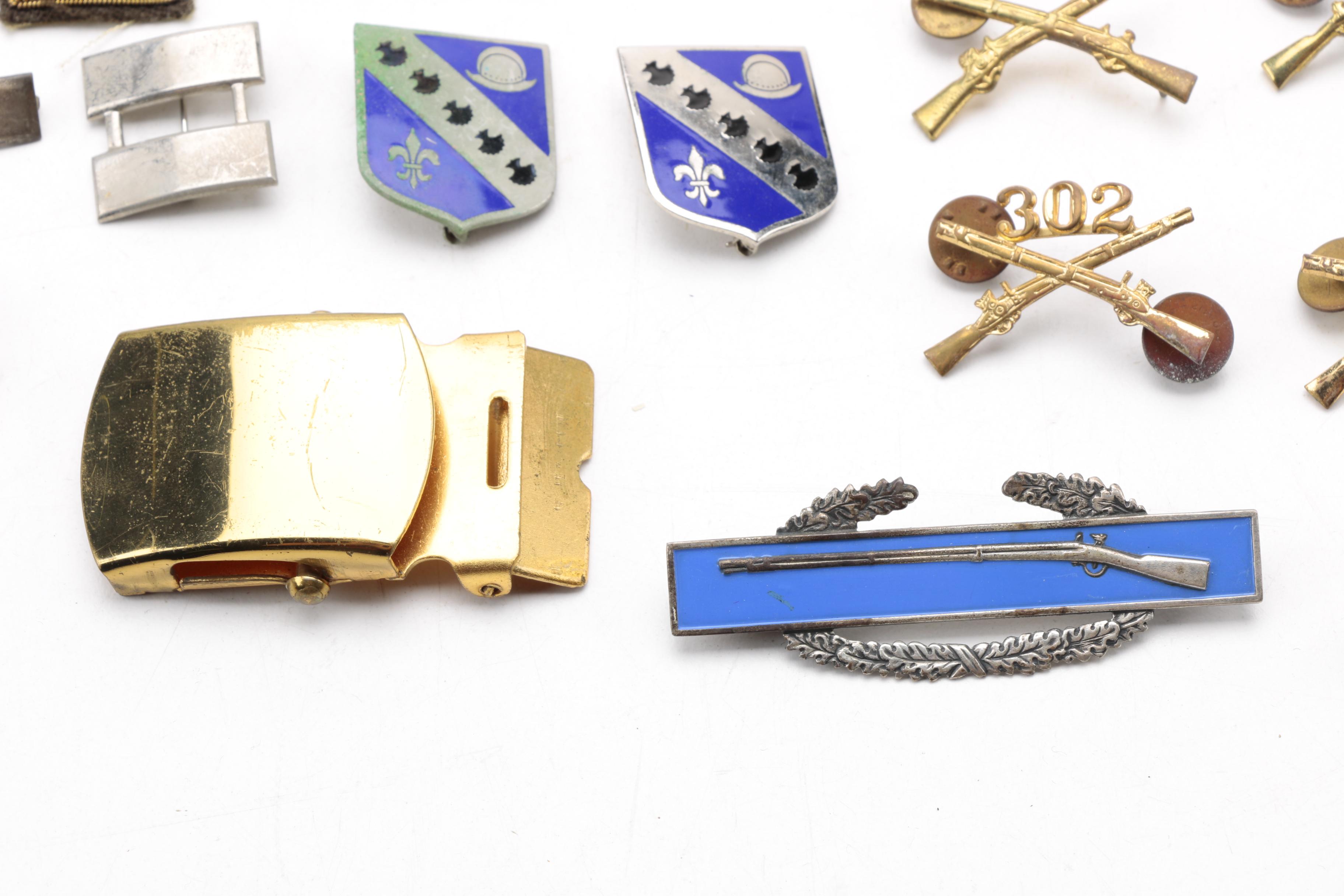 Assortment of Military Pins and Patches