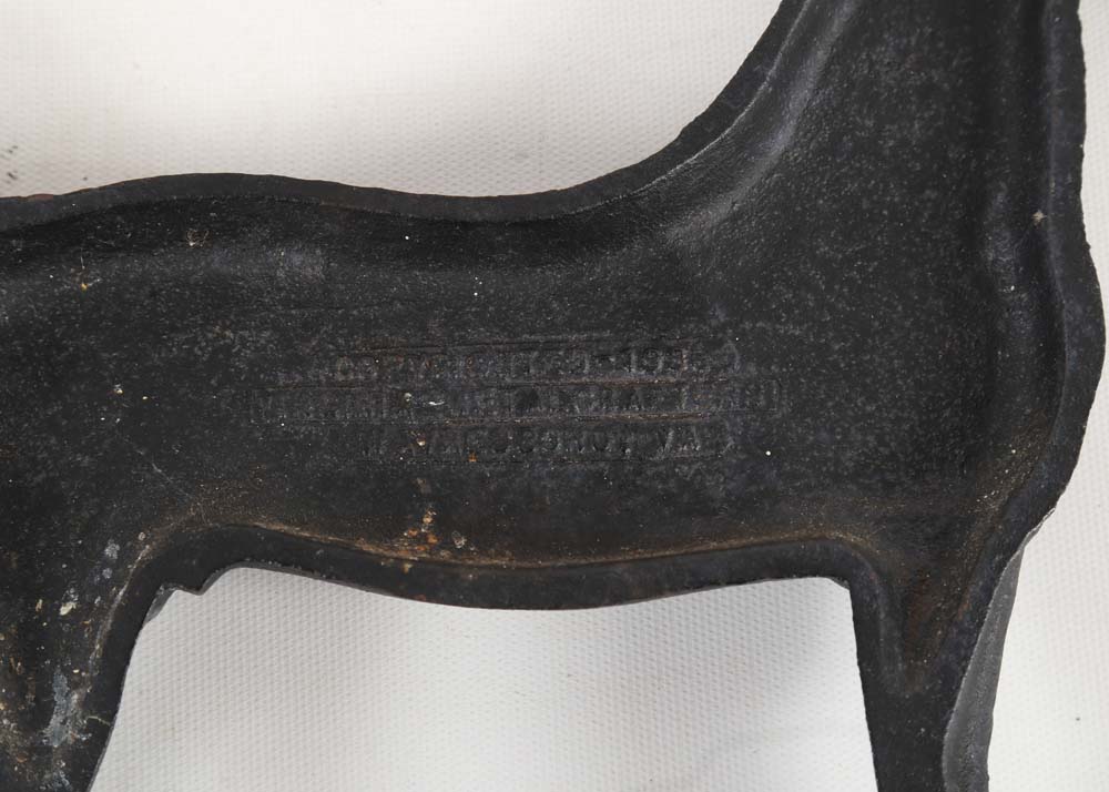 1938 "Kings Genius" Cast Metal Doorstop