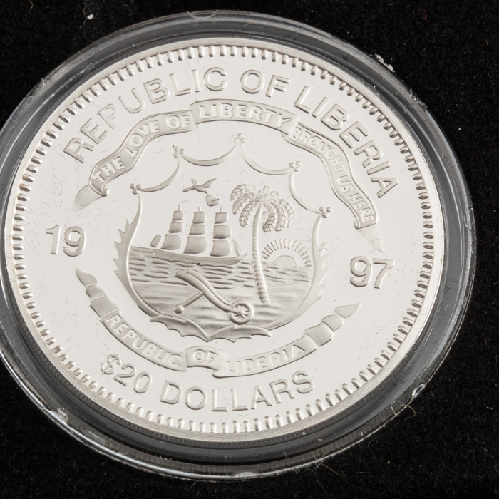 Set of Twenty-Four Commemorative Liberian $20 .999 Silver Coins