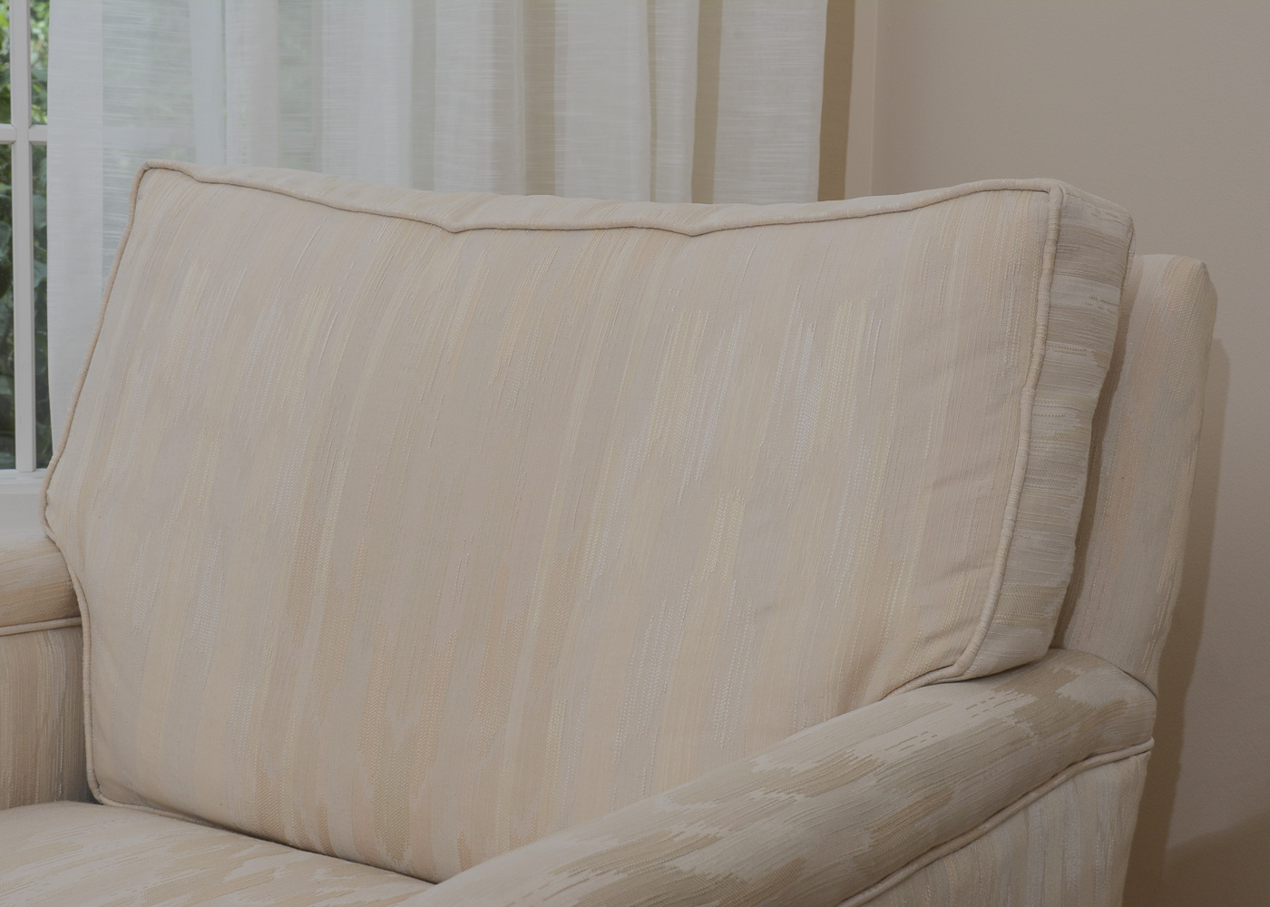 Accent Chair and Ottoman with Custom Crafted Upholstery