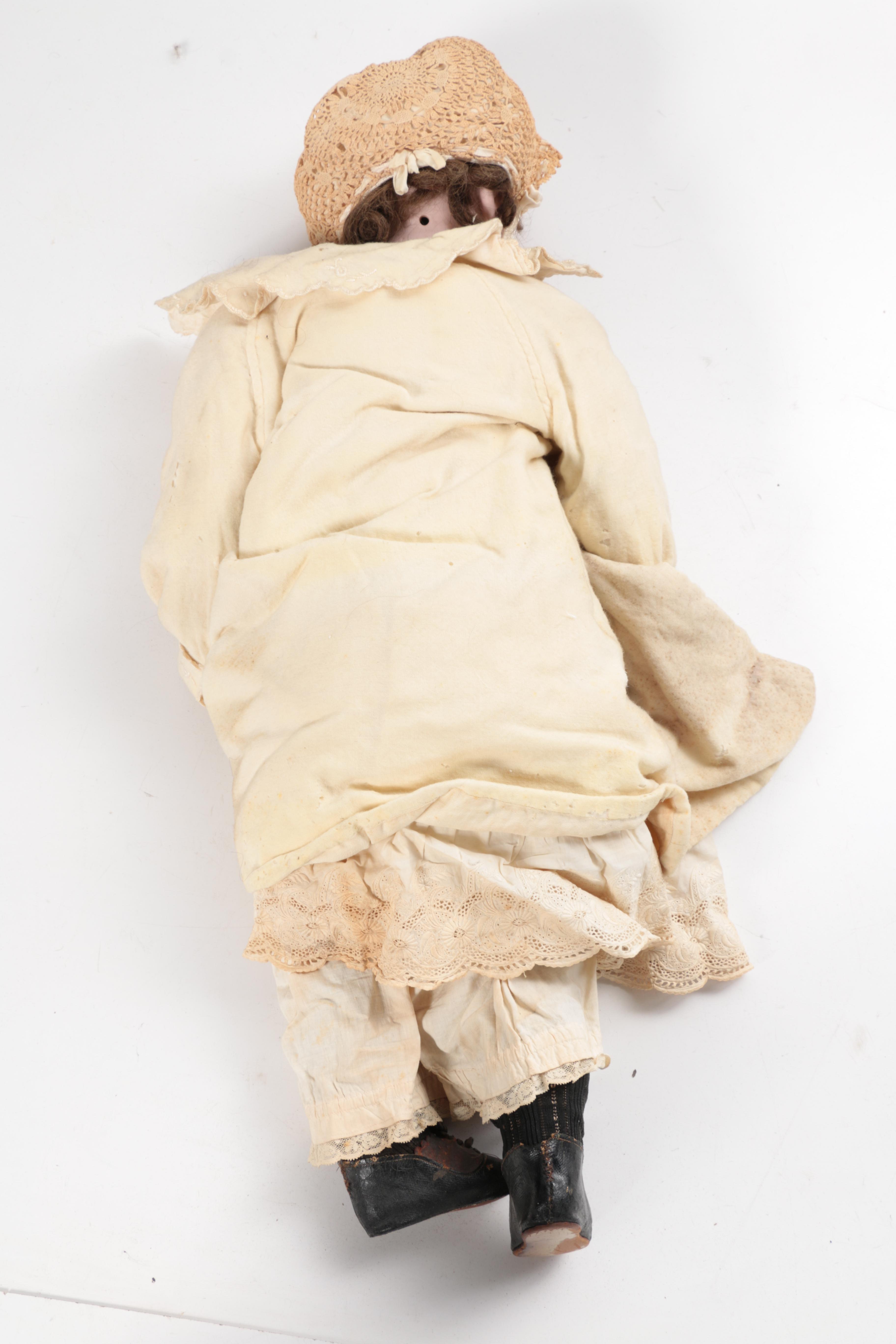 Vintage Porcelain Doll and Rocking Chair