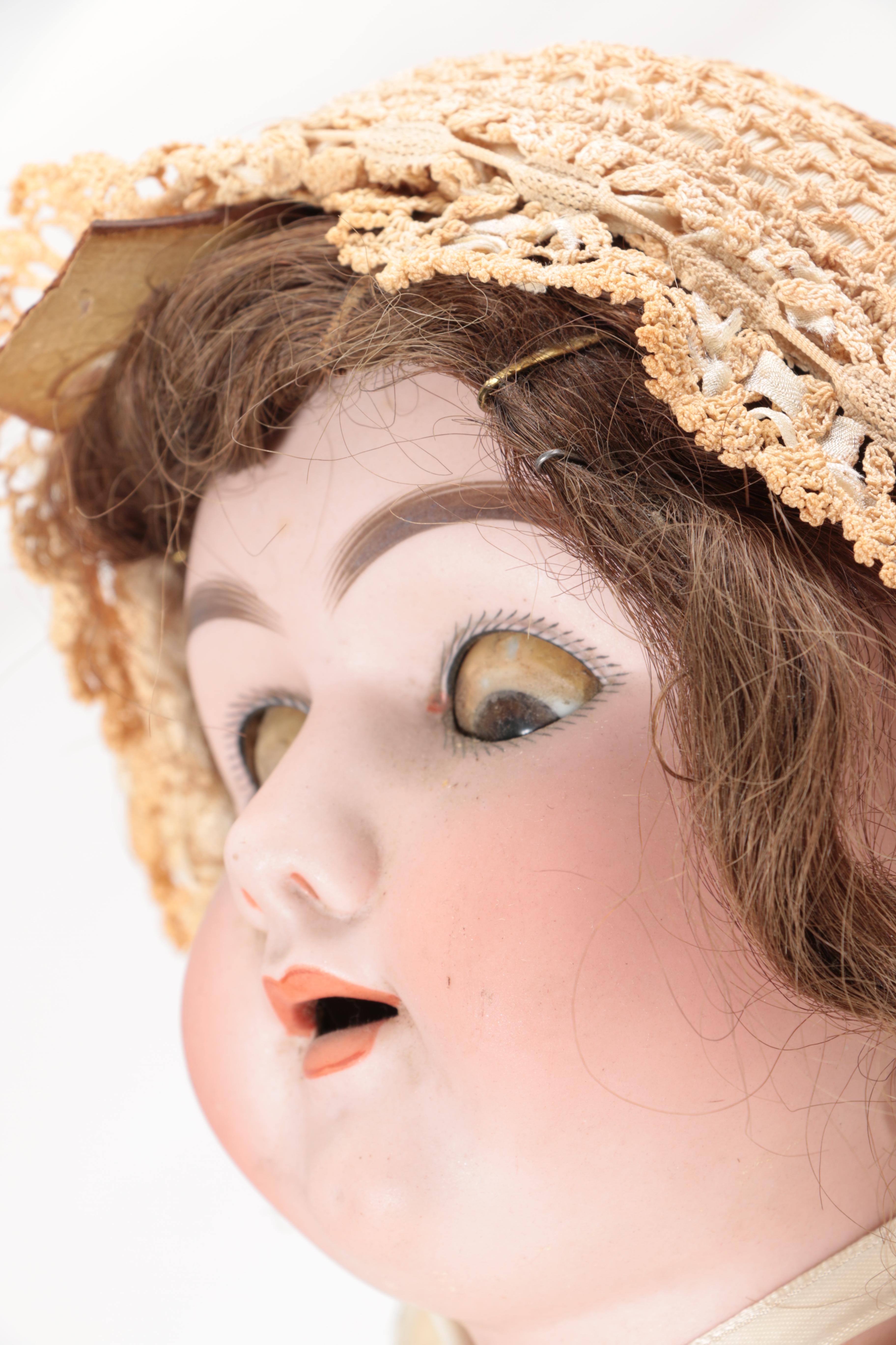 Vintage Porcelain Doll and Rocking Chair