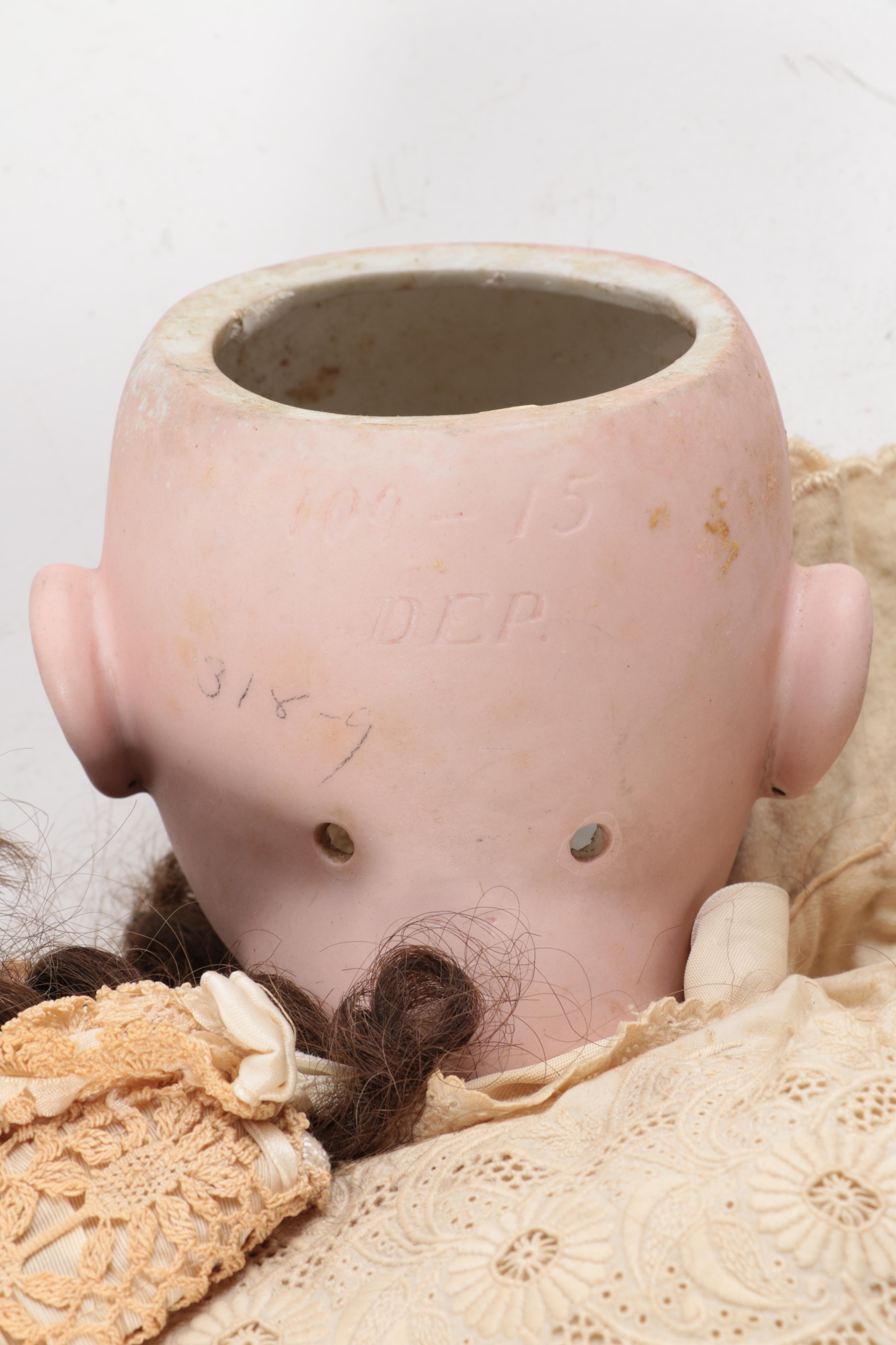 Vintage Porcelain Doll and Rocking Chair